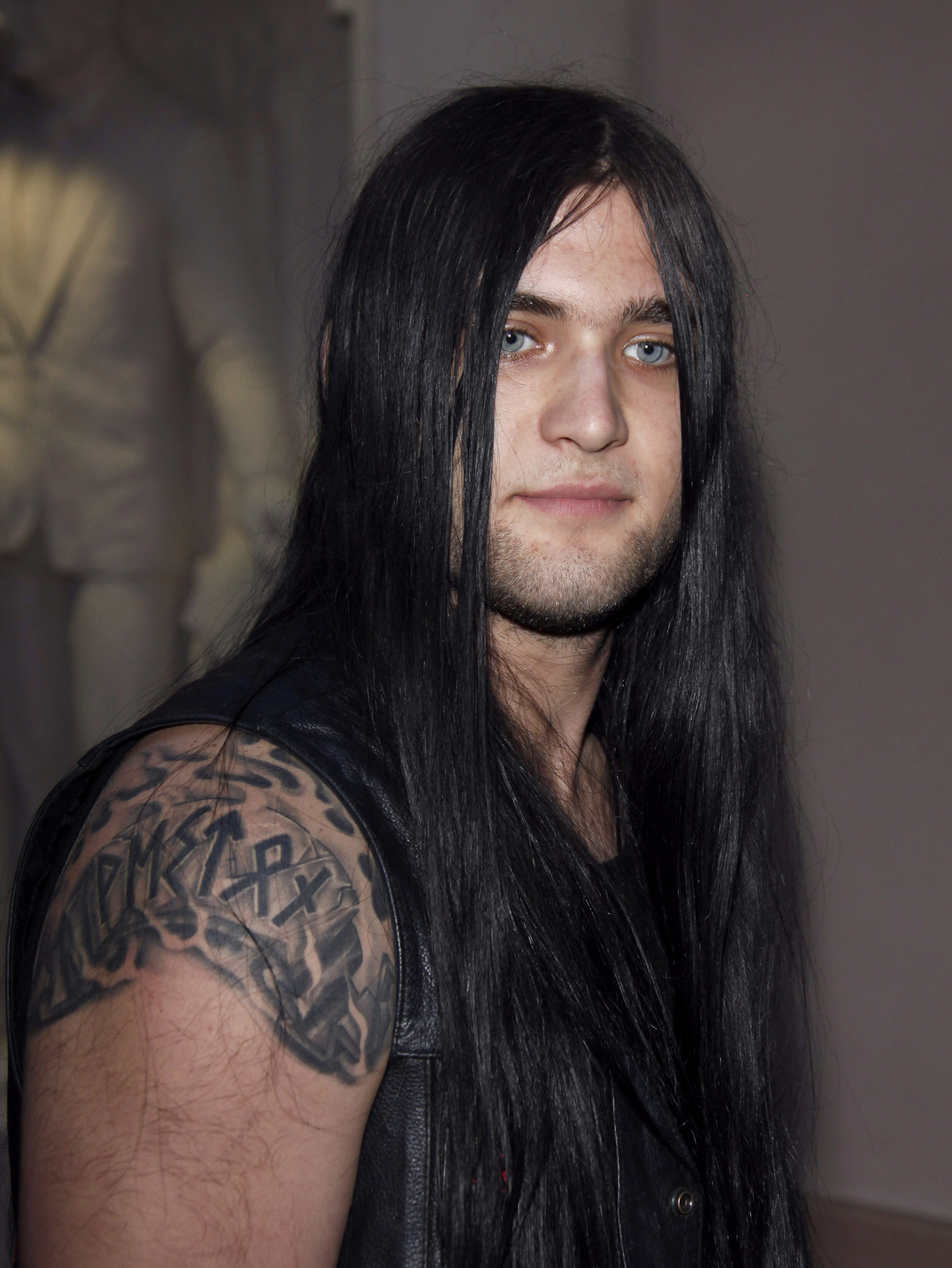 Weston Cage Coppola showcased the heavy-metal image that became closely associated with his early career when he attended the Los Angeles premiere of "The Raven" at the Leonard H. Goldenson Theatre. Photographed in North Hollywood, California, on June 12, 2009, Coppola wore his dark hair long and straight, pairing the dramatic look with a sleeveless leather vest that revealed the tattoos covering his upper arm.