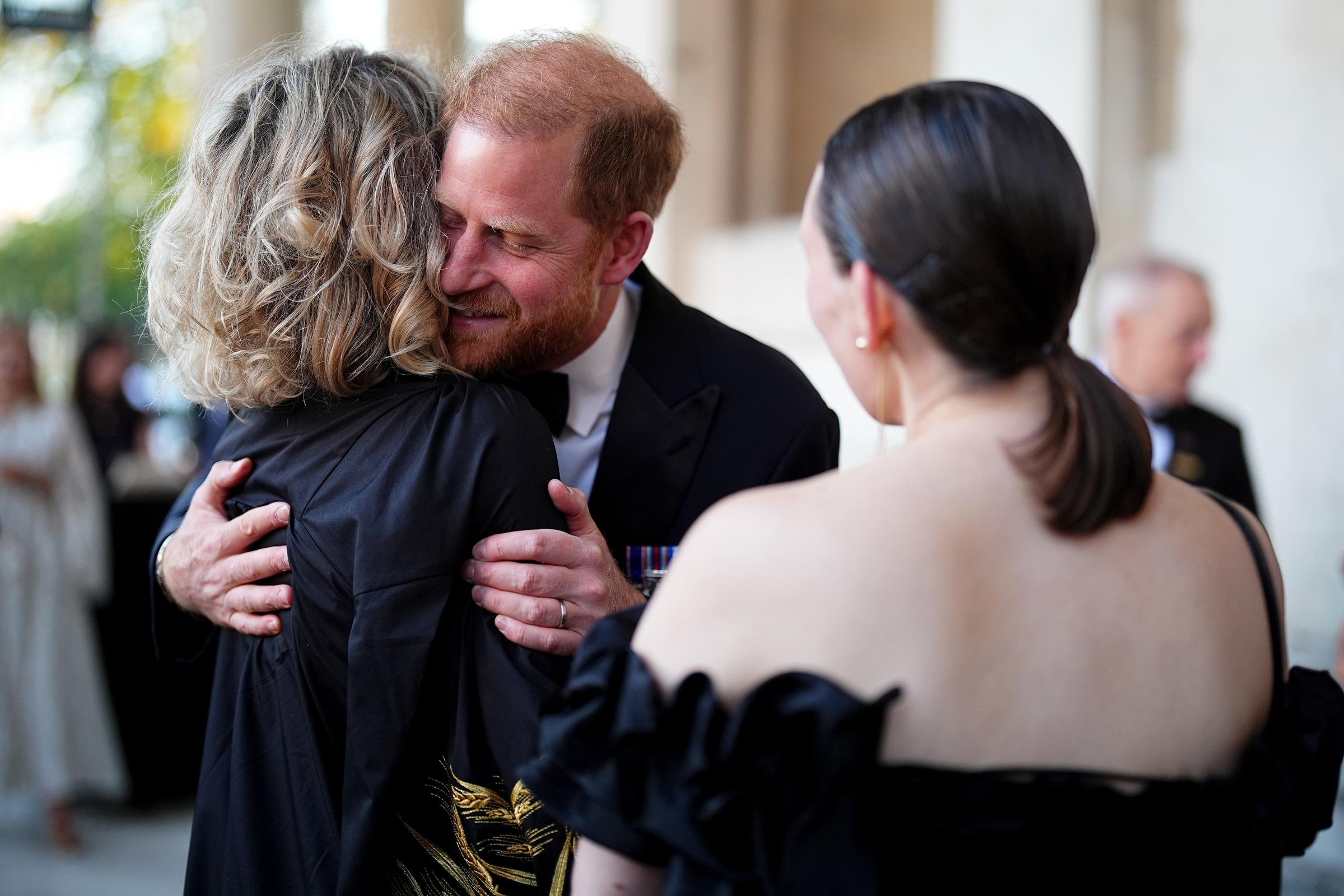 He arrived in black tie for the formal ceremony supporting the Invictus Games Foundation. While he posed with veterans, intense online reaction brewed over his striking new look and wardrobe choices. | Source: Getty Images