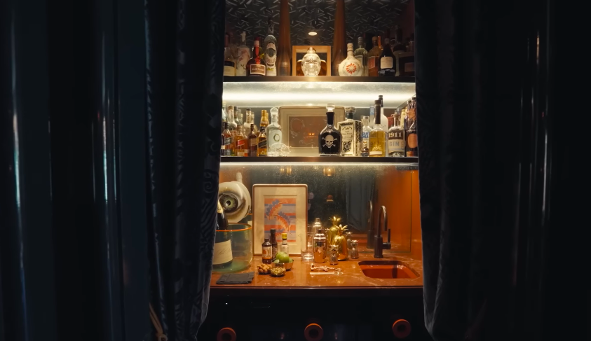 The hidden-bar effect makes the top floor feel like a surprise chapter. It is one of the reasons the home tour had such strong entertainment value. | Source: YouTube/Architectural Digest