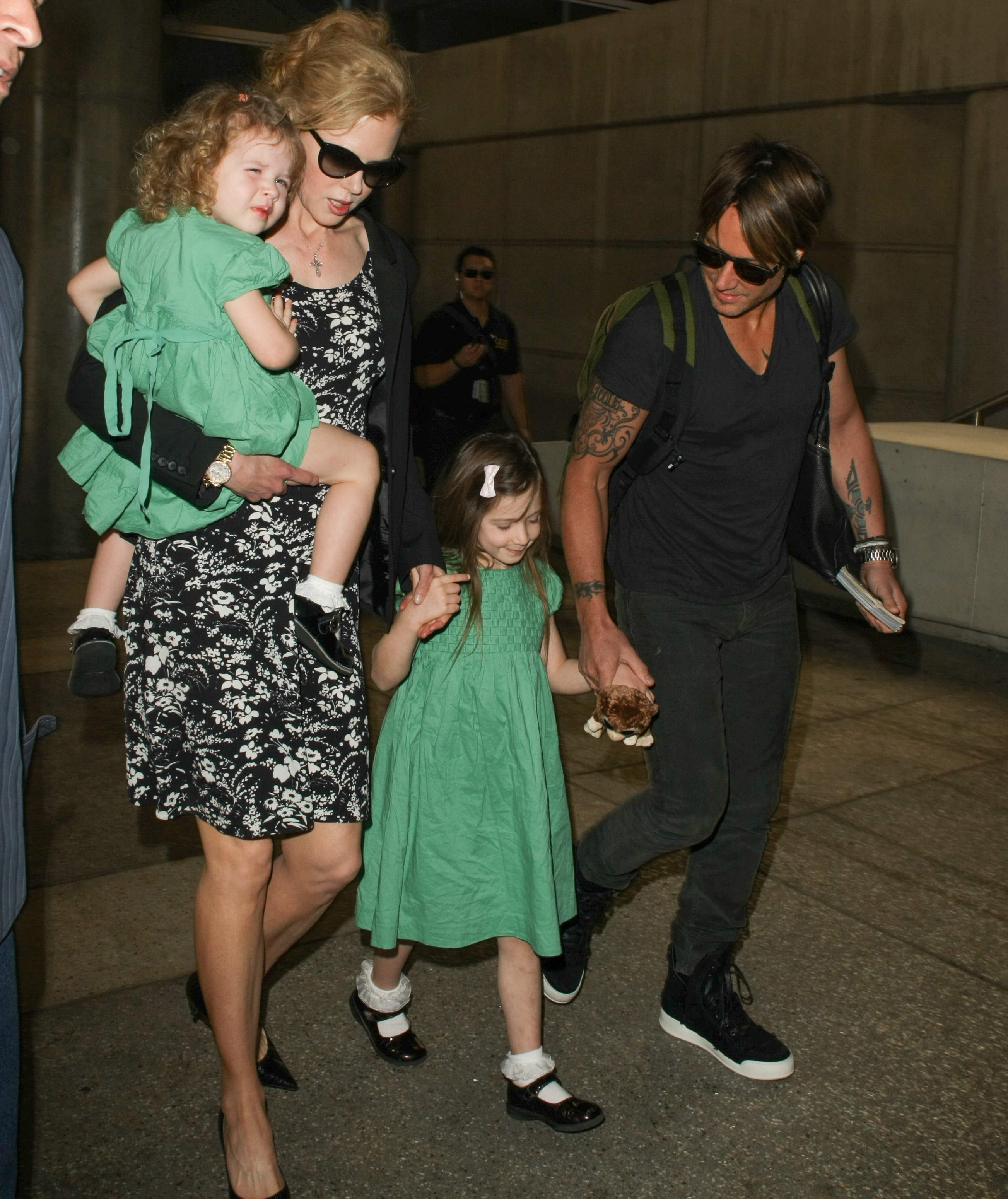Nicole Kidman, Keith Urban, and their daughters, Sunday Rose and Faith Margaret, are seen at LAX airport in Los Angeles, California, on January 2, 2014 | Source: Getty Images