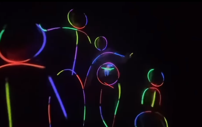 Swank's neon-outlined figure appears with a smaller stick figure near her belly as the dance continues. The detail offers viewers a closer look at the clue behind her unexpected announcement. | Source: Instagram/hilaryswank