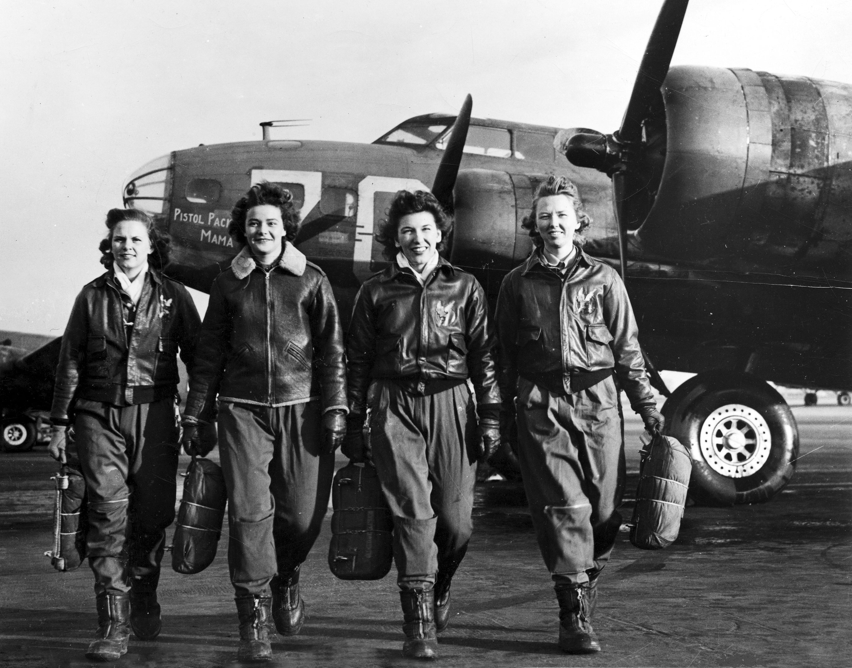 Four female pilots walking away from a B-17 bomber | Source: Getty Images