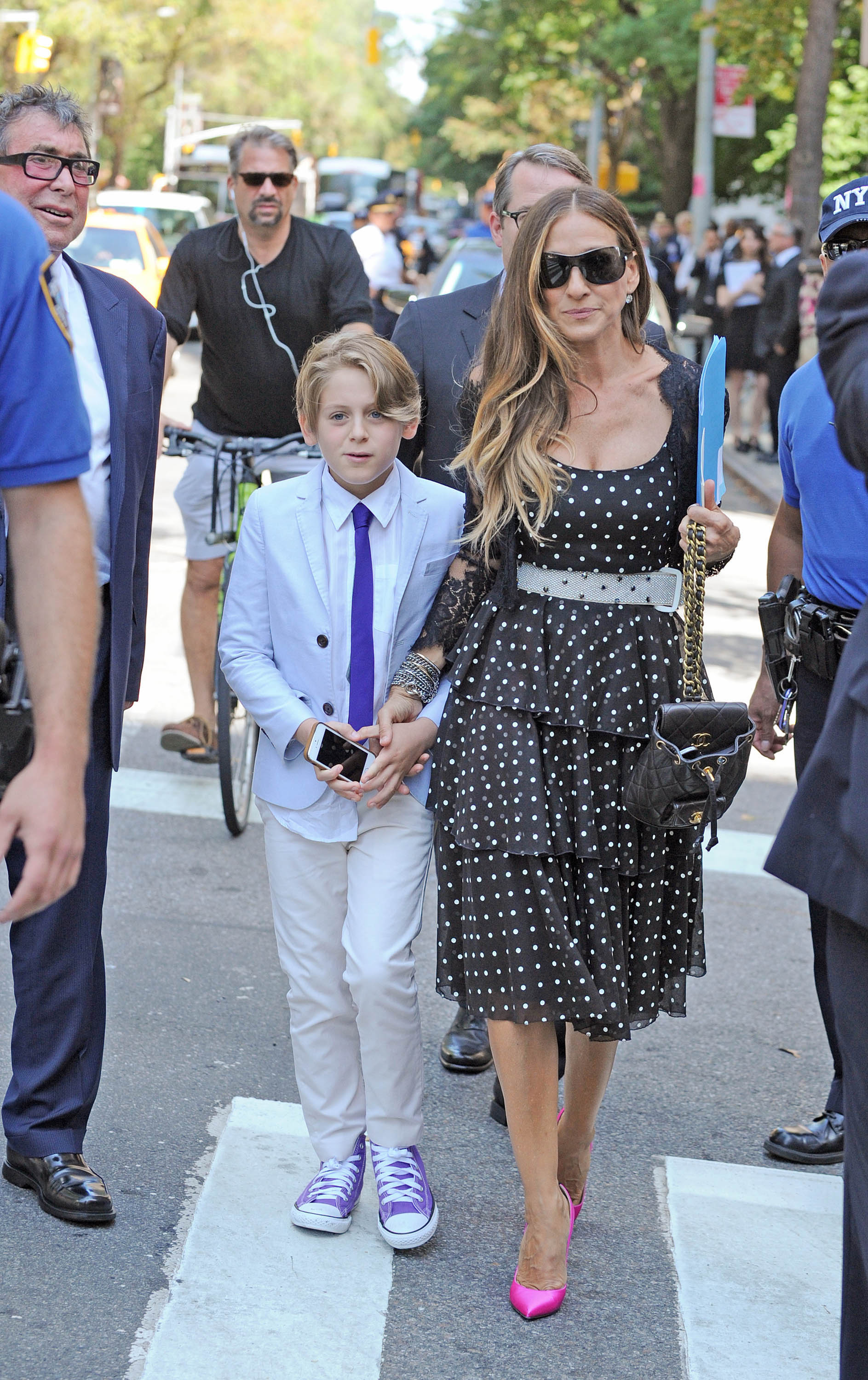 At 11 years old, James was entering his preteen years and already looked noticeably different from the little boy seen in earlier family photos. With longer swept-over hair, sharper facial features, and a more polished appearance, he accompanied his mother at a public event in New York City, offering another glimpse of his gradual transformation.