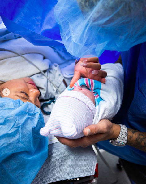 Ammika Harris and Chris Brown sharing loving moments with their son, Aeko Brown, after his birth, posted on December 14, 2019. | Source: Instagram/chrisbrownofficial