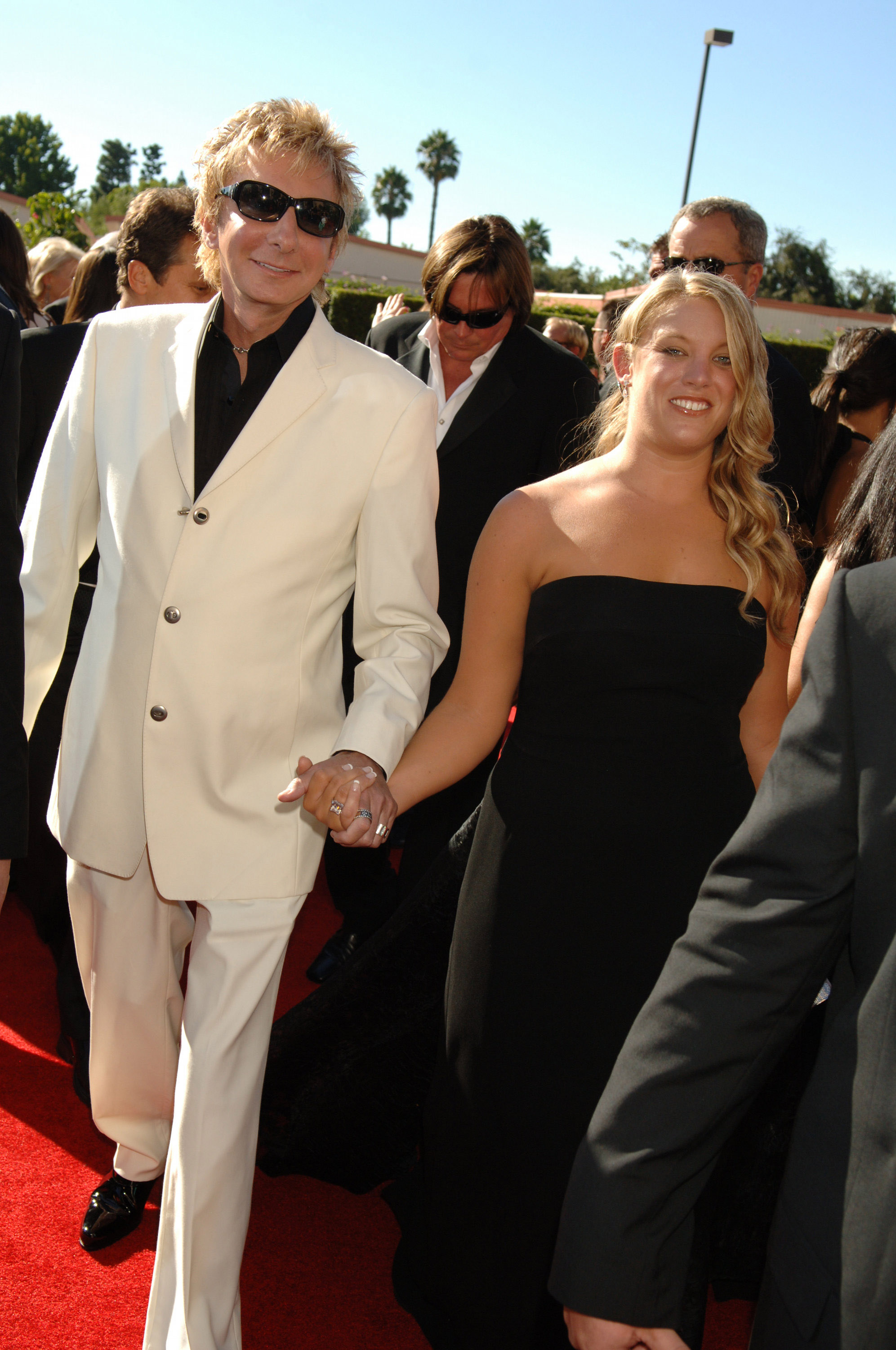 Barry Manilow is with a woman at the 58th Primetime Emmy Awards in Los Angeles in 2006. | Source: Getty Images