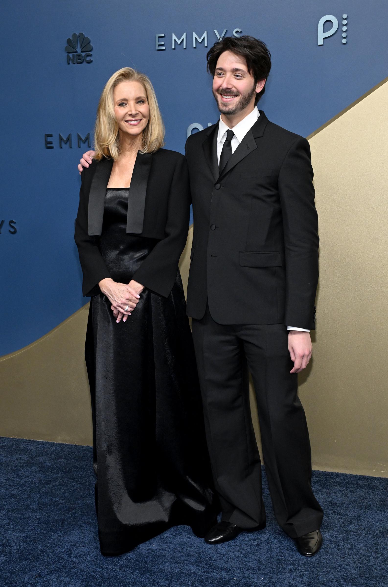 Other photos captured a warmer pose, with Stern placing an arm around his mother's shoulder as they smiled. Their expressions later prompted Instagram commenters to point out what they saw as nearly identical smiles. | Source: Getty Images