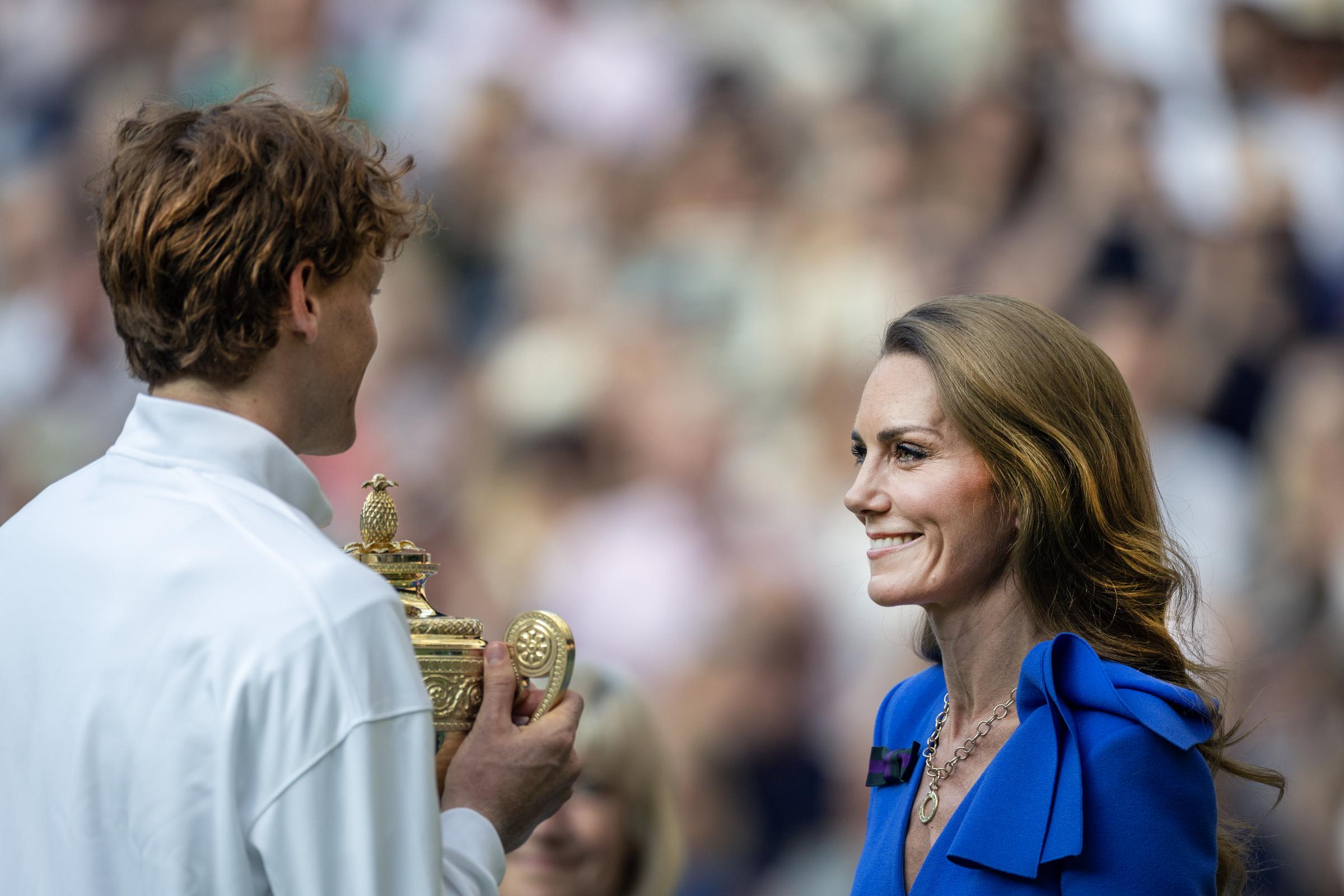 Princess Catherine presents Jannik Sinner with the Wimbledon men's singles trophy in London on July 13, 2025 | Source: Getty Images