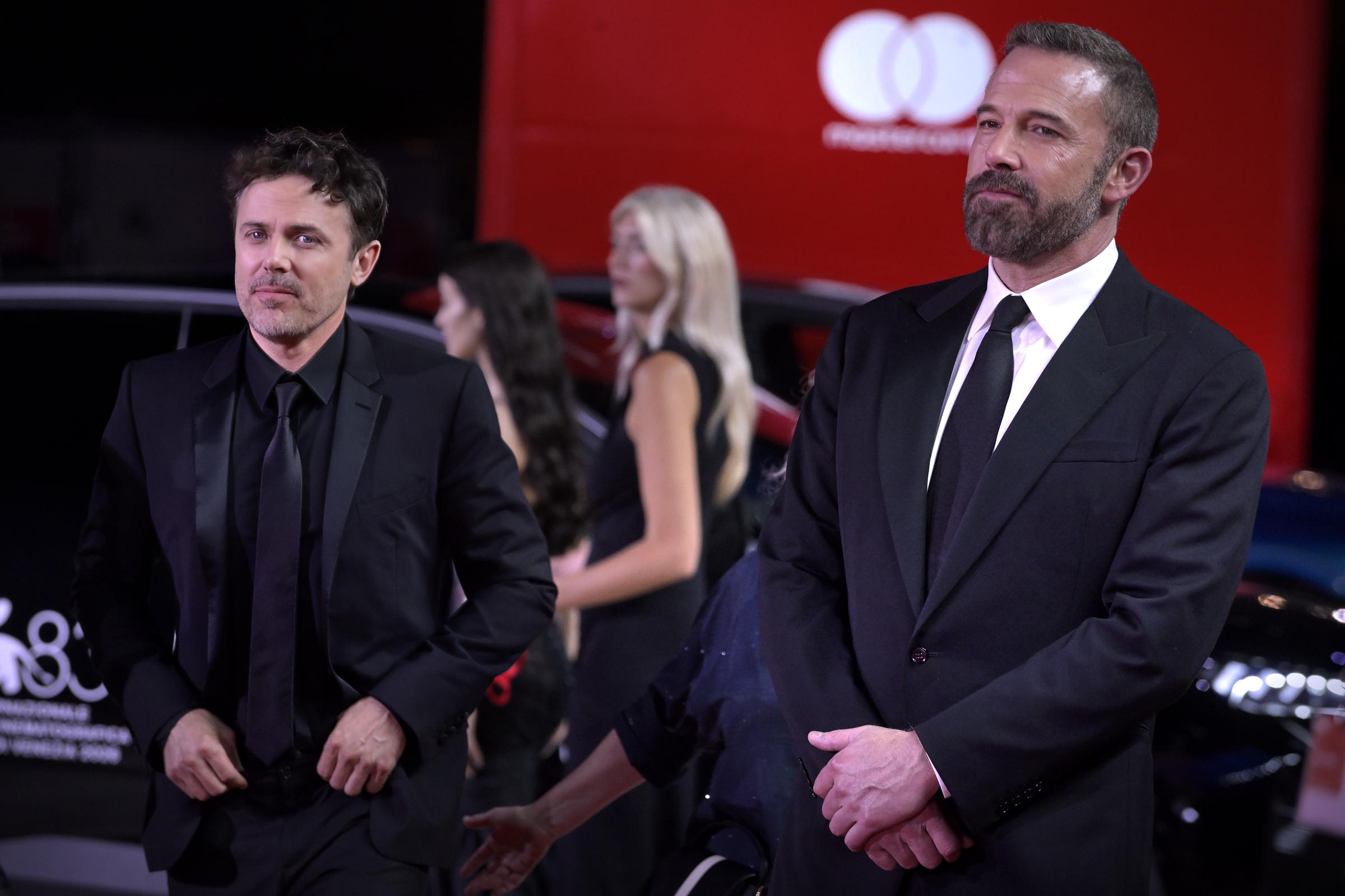 Coming together in solidarity, brothers Casey and Ben Affleck stood side by side at the "Company" red carpet during the 83rd Venice International Film Festival on September 8, 2026, putting on a united front after enduring a particularly challenging and difficult year. | Source: Getty Images