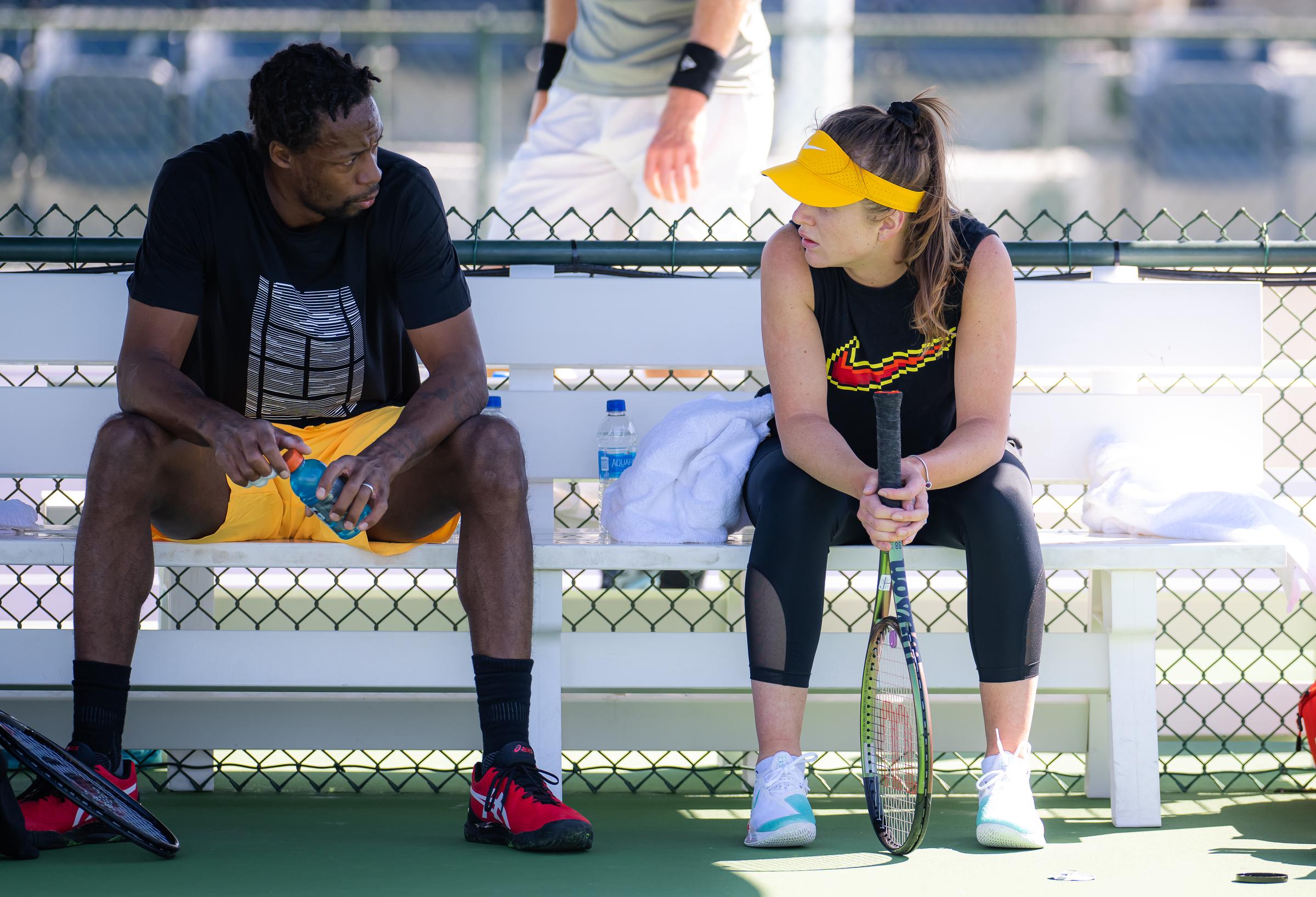 During a practice break at the 2022 BNP Paribas Open on March 7 in Indian Wells, California, Elina Svitolina and Gaël Monfils share a focused exchange. The candid moment captures their unique blend of partnership, both on and off the court.