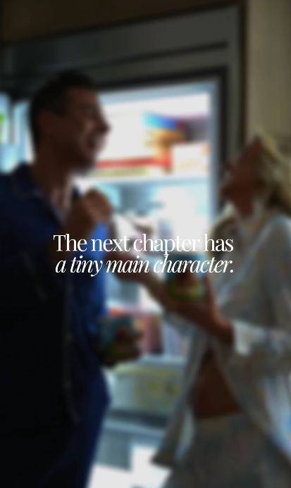 Savannah and her fiancé share a playful moment in front of an open refrigerator in a scene from their pregnancy announcement video. The couple used the lighthearted clip to celebrate the next chapter of their relationship as they prepare to welcome a baby. | Source: Instagram/savannahchrisley