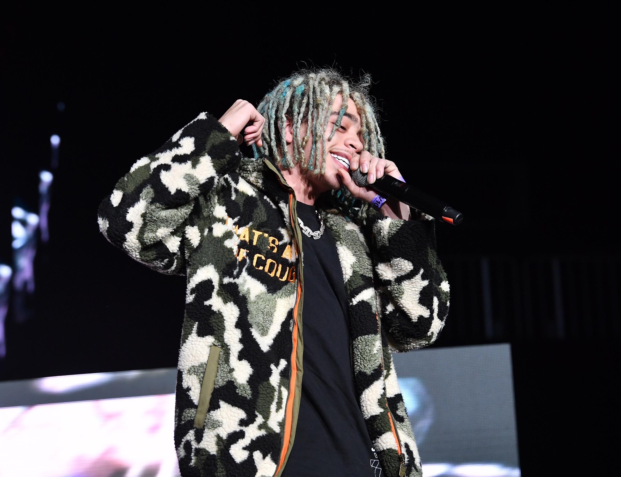 King Harris performs live during V-103 Winterfest at State Farm Arena in Atlanta, Georgia, on December 15, 2023 | Source: Getty Images