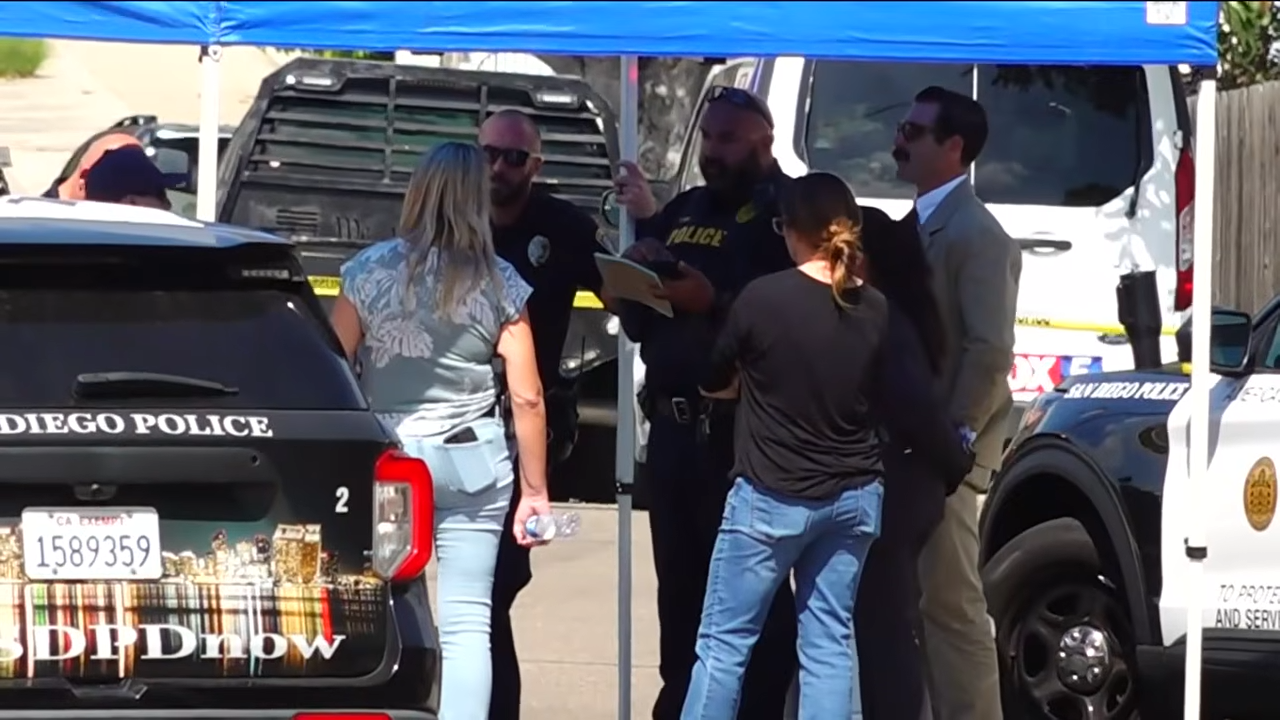 San Diego police and other personnel gather at the scene as authorities investigate the deaths of three members of the Voight family. | Source: YouTube/FOX 5 San Diego