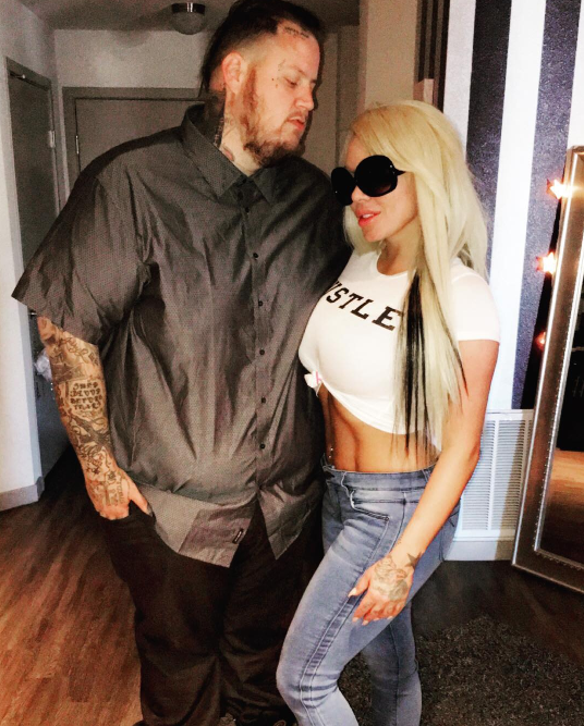 The couple did not have children, but technology can offer a playful glimpse into what their family might look like. Here are Jelly Roll and Bunnie Xo posed at a home photo on July 8, 2016. | Source: Instagram/xomgitsbunnie