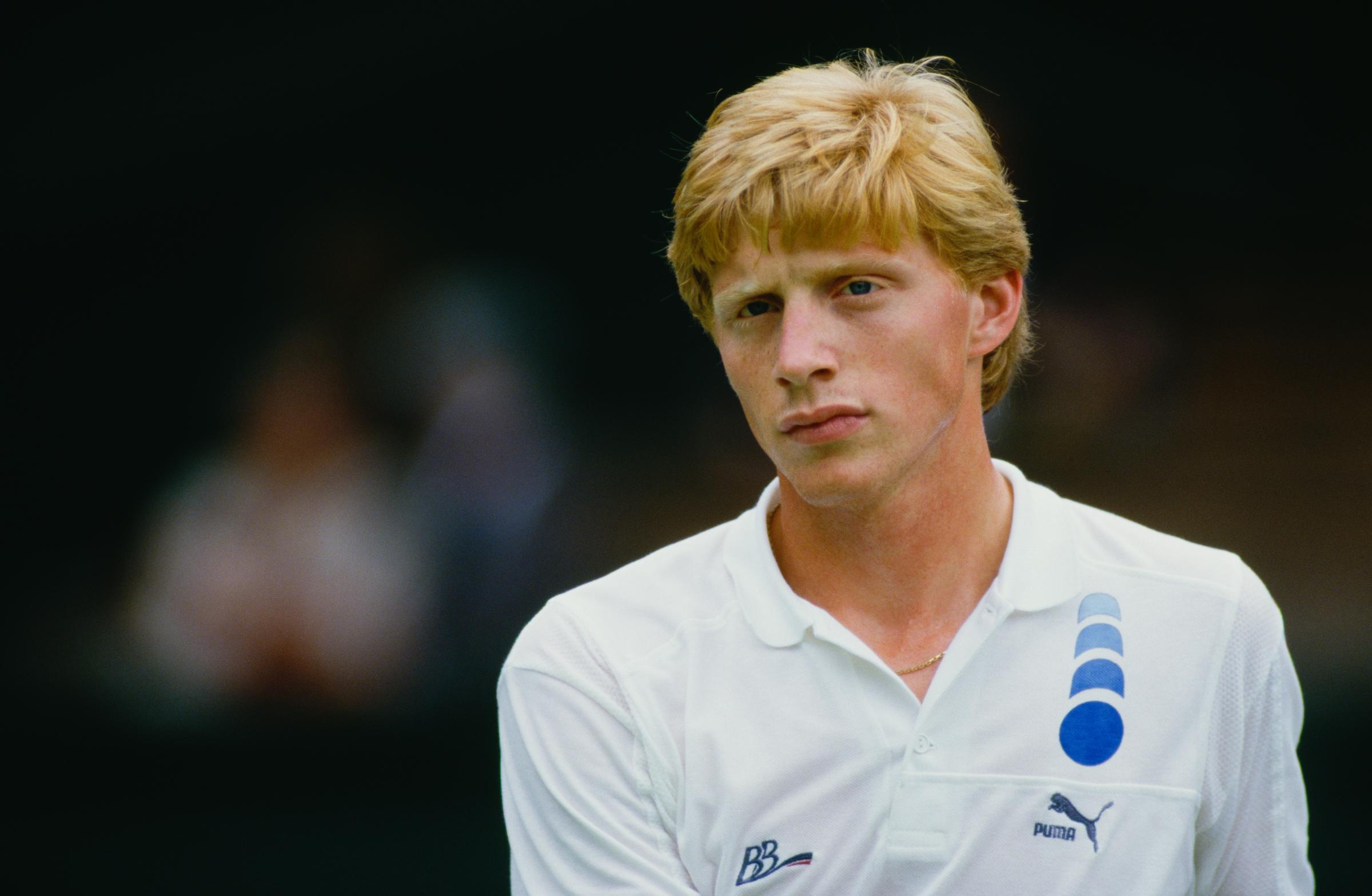 Boris Becker competed at Wimbledon in London, England, in 1987, returning to the tournament where he had already established himself as one of tennis's leading players. By then, the German had won the men's singles title in two consecutive years, successfully defending his historic 1985 championship with another triumph in 1986 and proving that his teenage breakthrough was far more than a one-off.