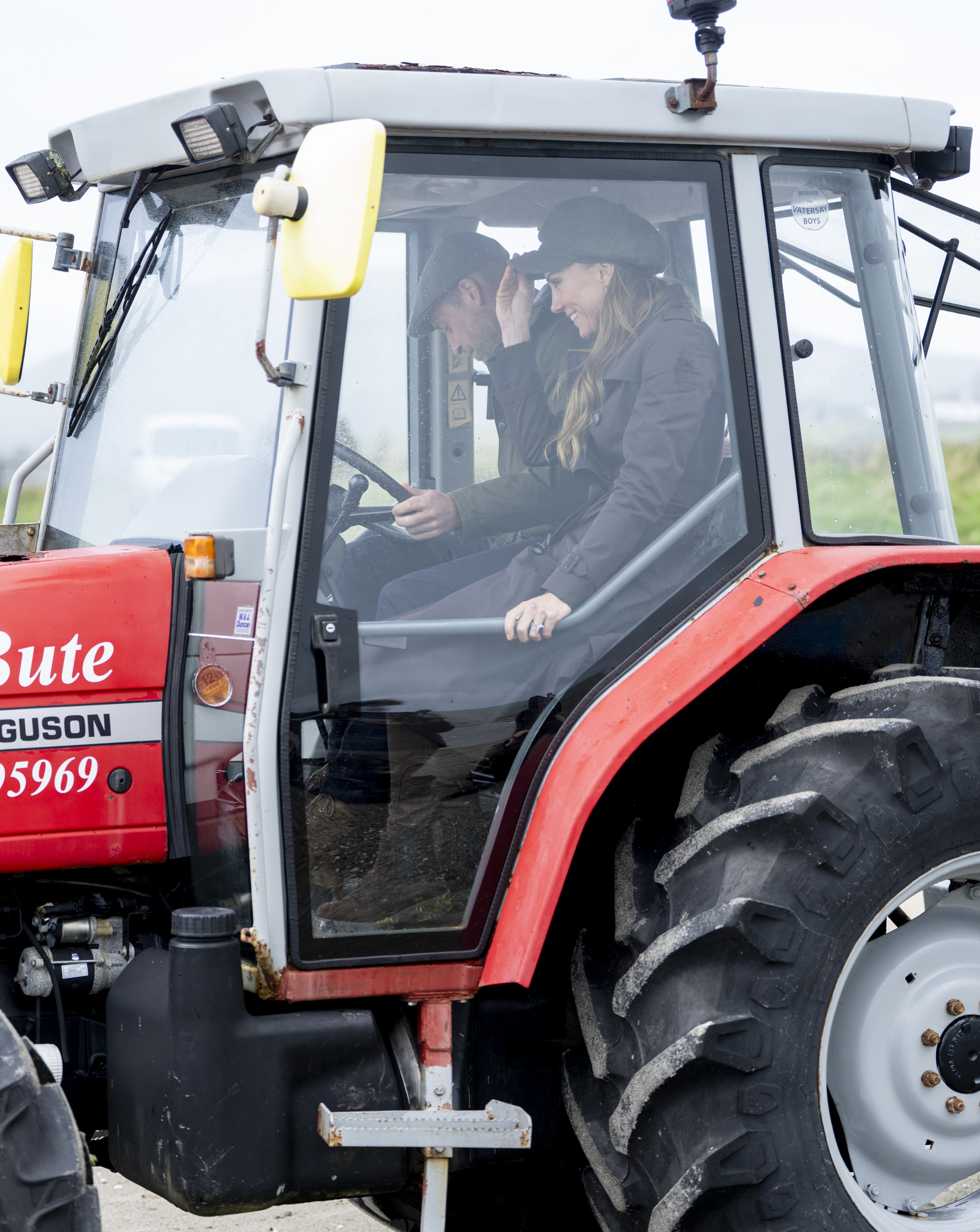 Prince William took the wheel of a tractor at Ettrick Bay, with Catherine seated beside him. The unexpected ride added another hands-on moment to the couple's visit with the Beachwatch Bute team. | Source: Getty Images