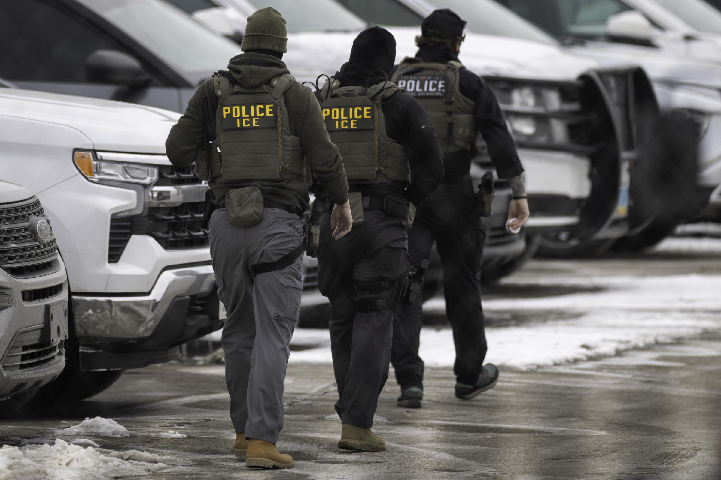 ICE agents. | Source: Getty Images