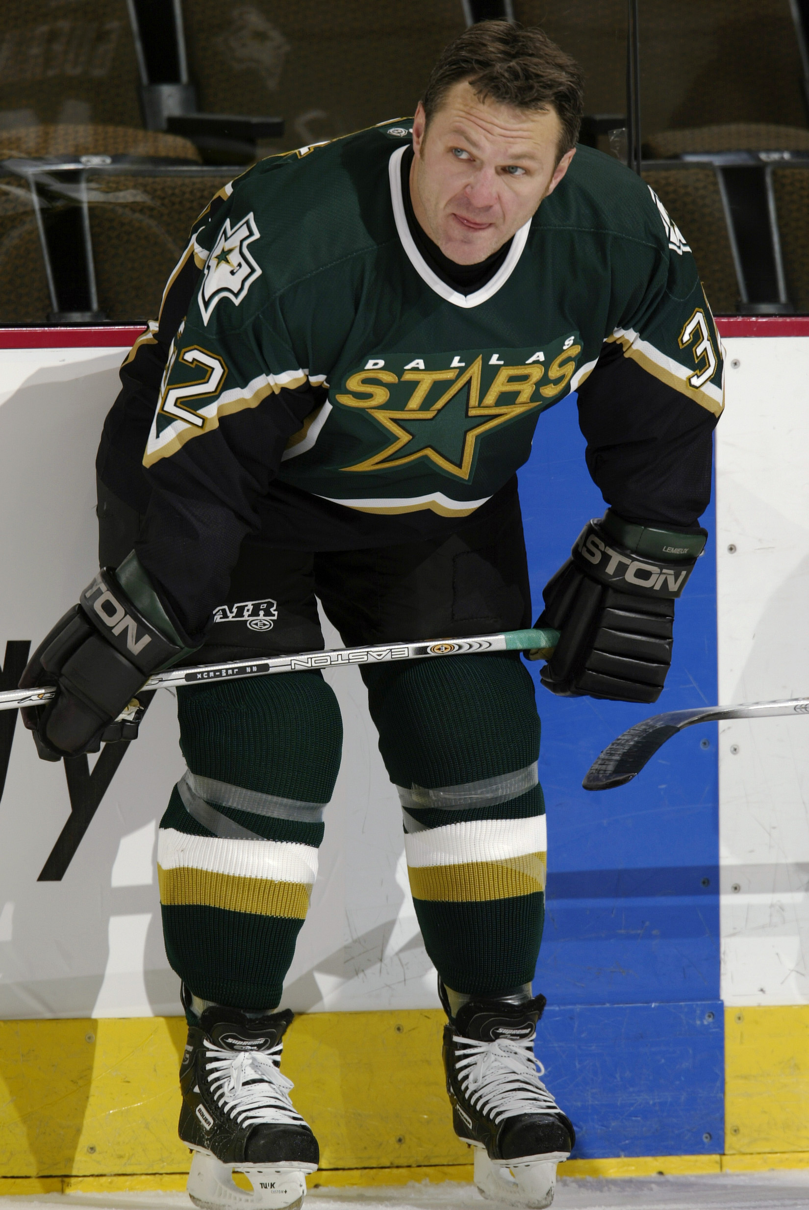 Claude Lemieux #32 of the Dallas Stars watches his old teammates on the Colorado Avalanche during pregame warmups on January 20, 2003. | Source: Getty Images