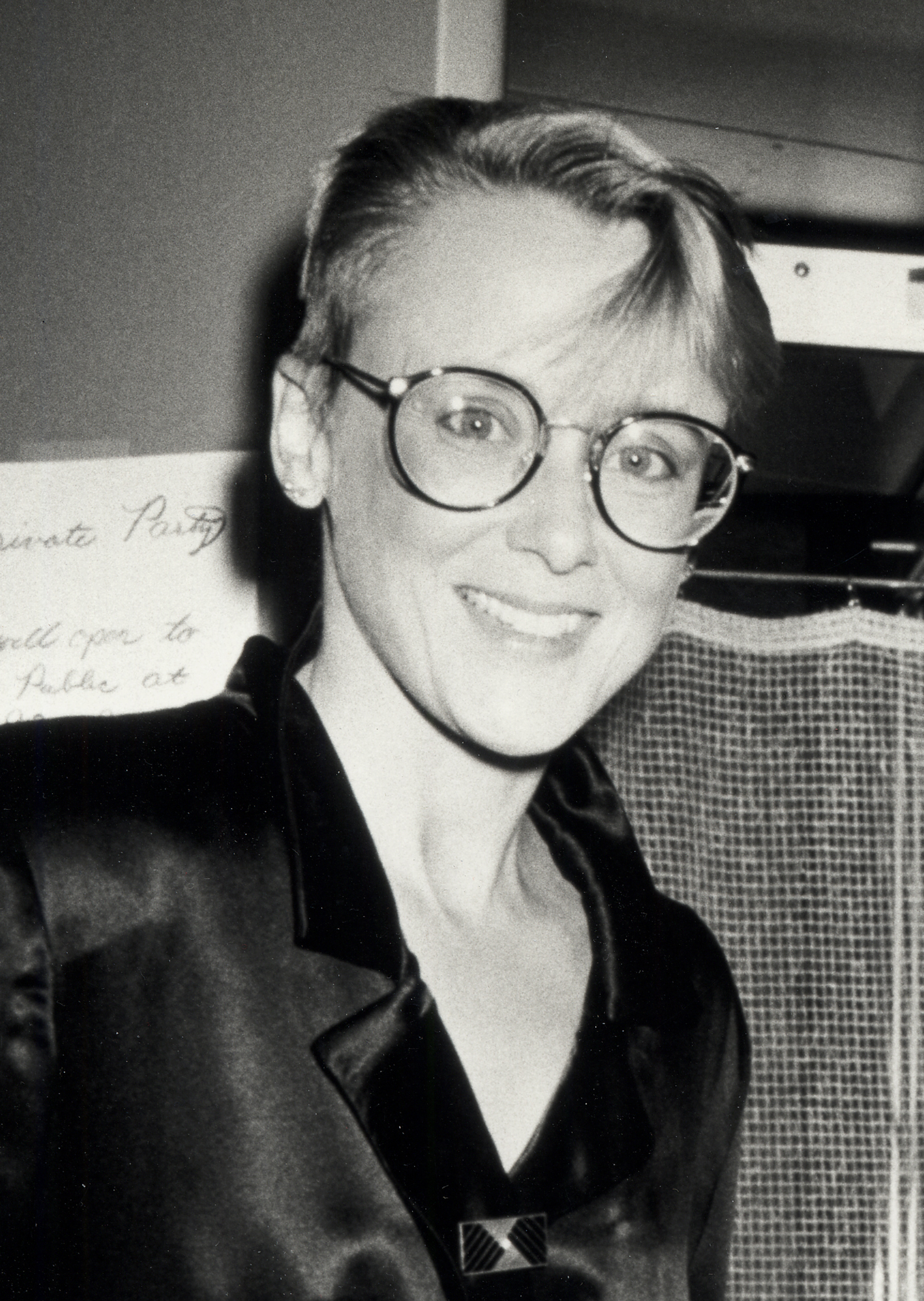 Mary Beth Hurt smiles in a close-up at the New York screening of "Plenty" in 1985. Wearing oversized round glasses and a satin jacket, Hurt shows off a sharper, more modern look during a mid-1980s red-carpet appearance.
