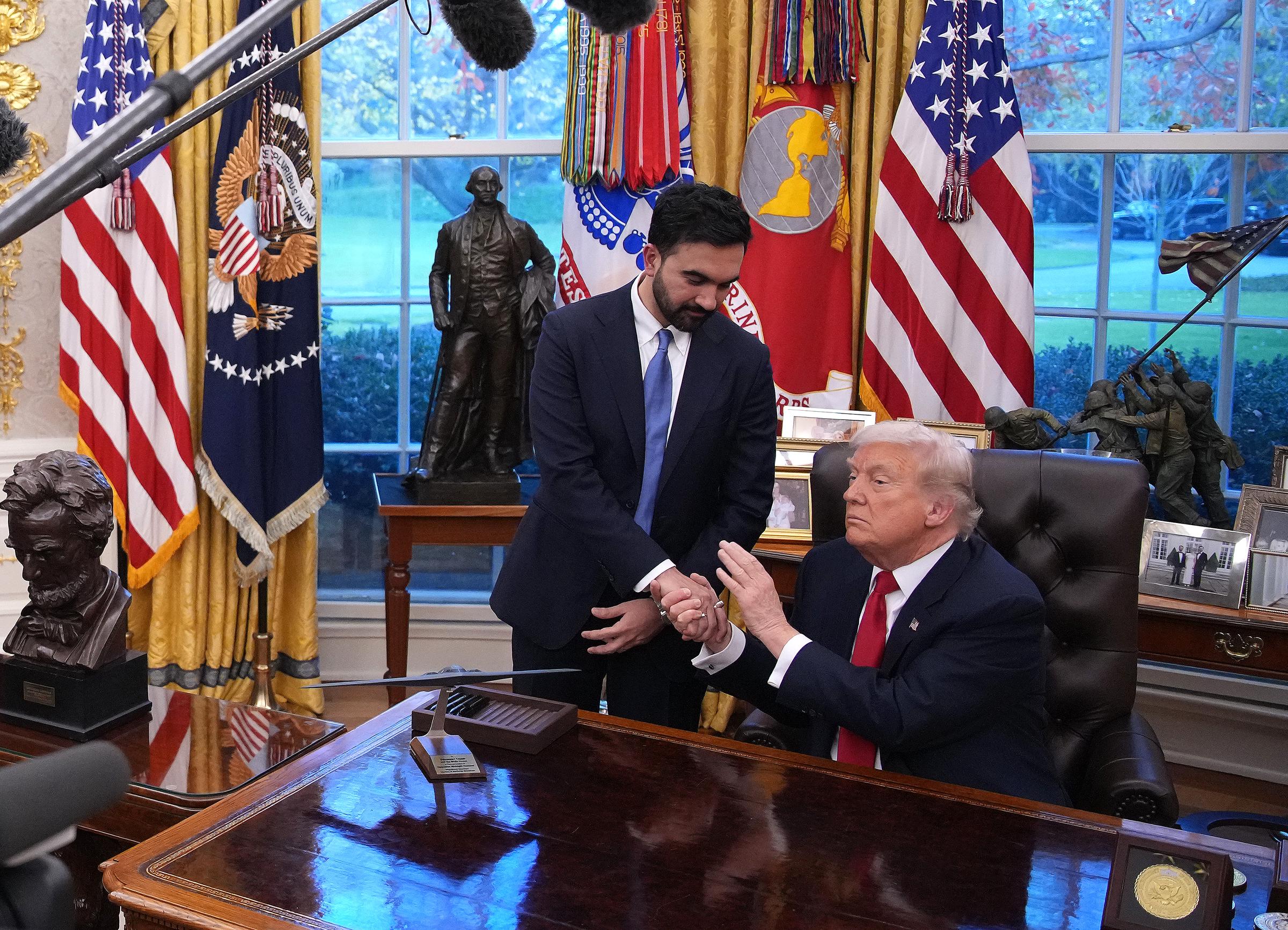 Donald Trump shakes hands with New York City Mayor-elect Zohran Mamdani during a meeting in the Oval Office of the White House on November 21, 2025 | Source: Getty Images