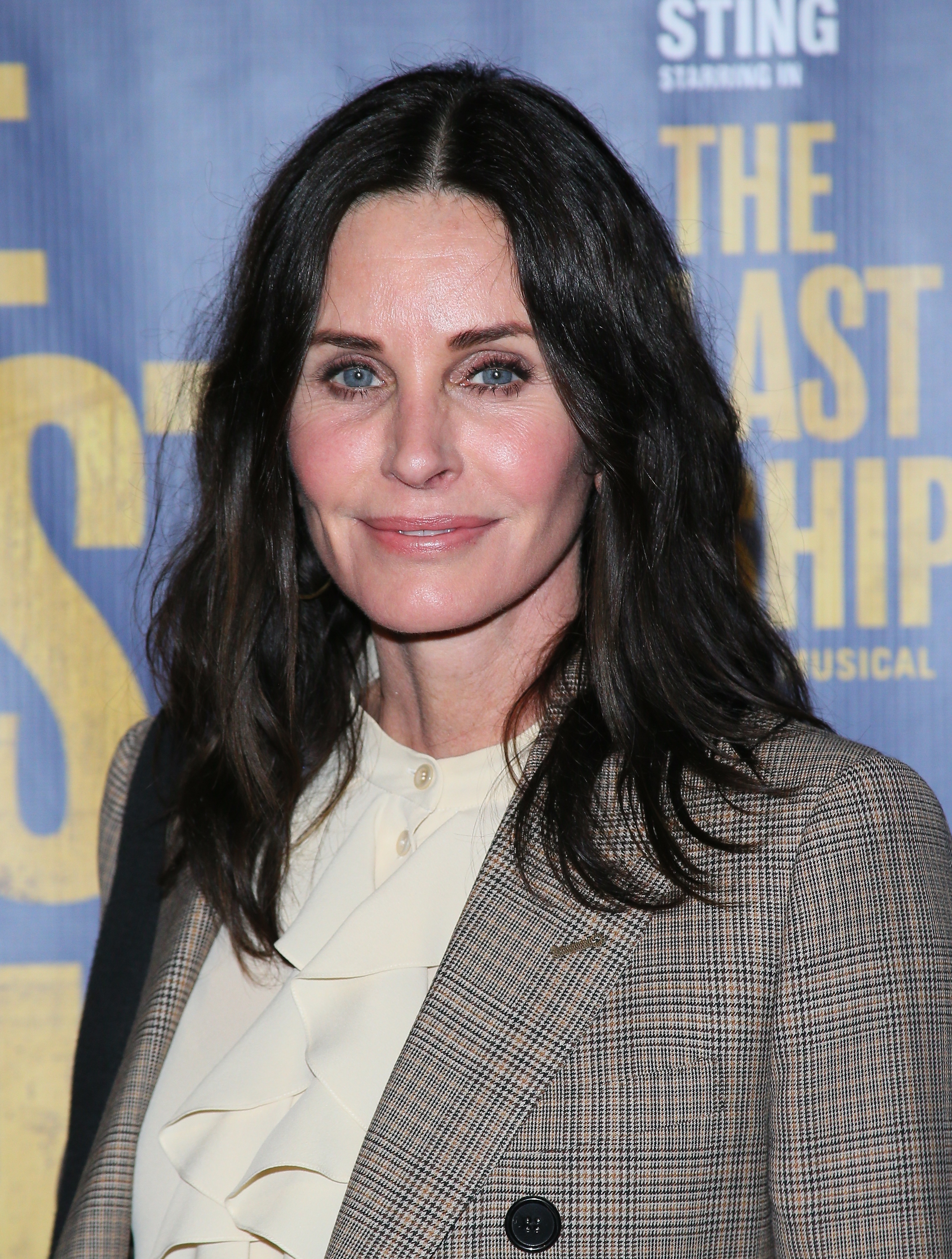 Courteney Cox steps out in a cream top and checkered suit for "The Last Ship" Opening Night Performance on January 22, 2020, in Los Angeles, California.