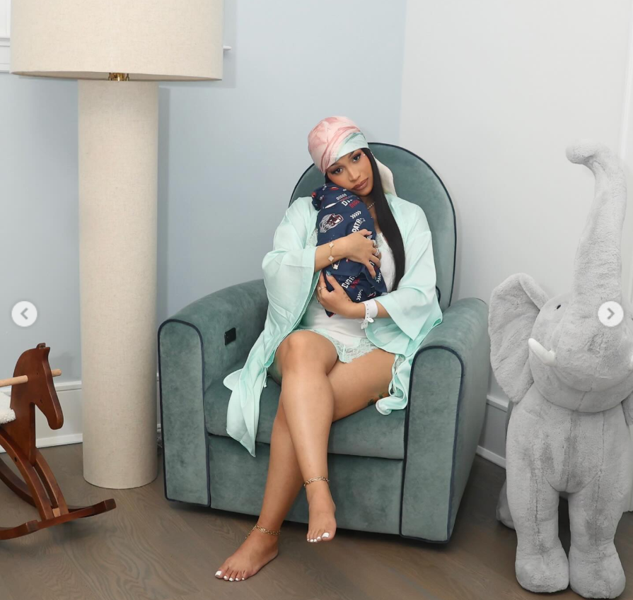 Cardi B cuddles her new born baby, as seen from a post dated November 19, 2025. | Source: Instagram/iamcardib