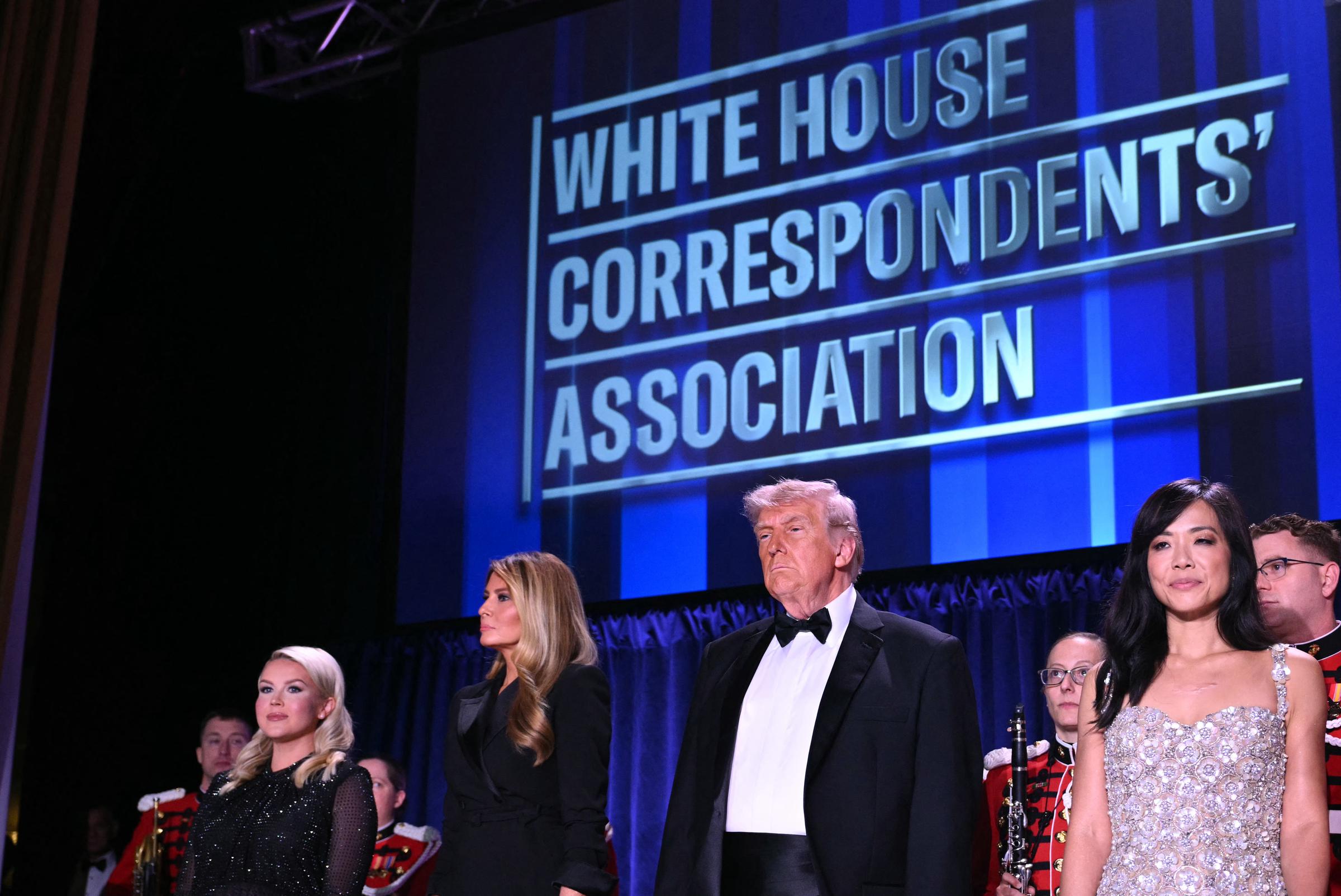 White House Press Secretary Karoline Leavitt, First Lady Melania Trump, President Donald Trump and CBS News senior White House correspondent Weijia Jiang attend the White House Correspondents' dinner in Washington, DC, on April 25, 2026. | Source: Getty Images