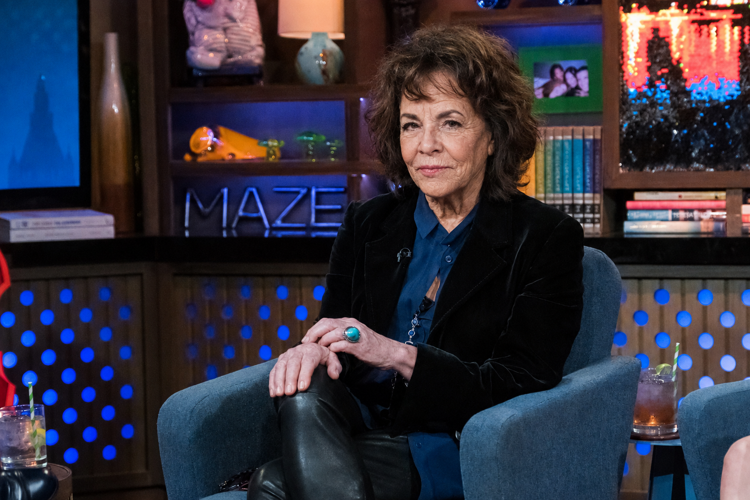 An AI-generated interpretation of Stockard Channing with a more natural facial appearance, pictured during a television interview. | Source: ChatGPT