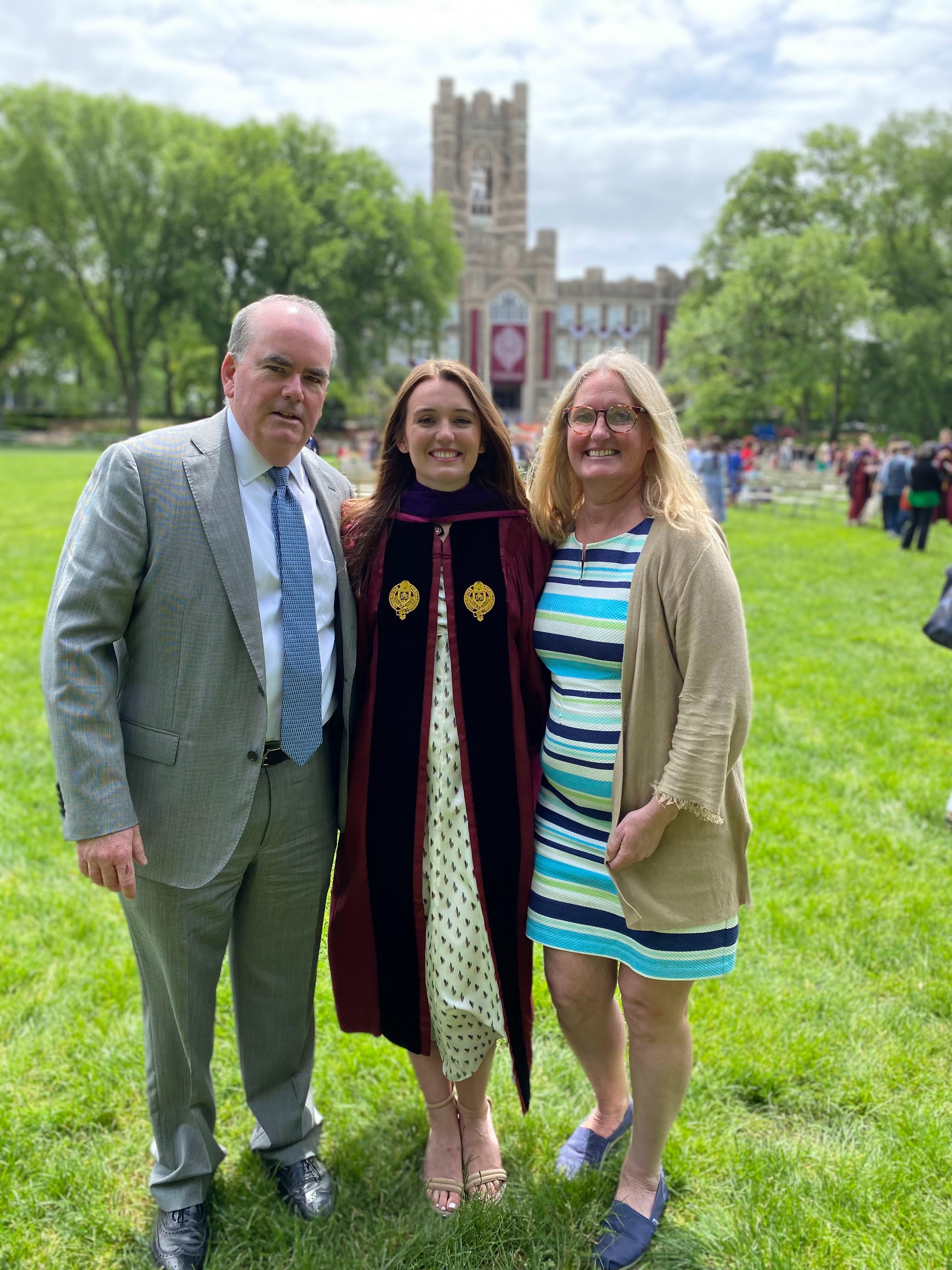 Erin Piacente and her parents during her graduation in a photo posted to the fundraiser. | Source: GoFundMe