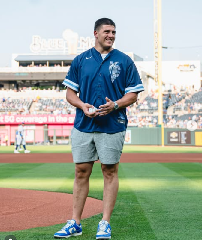 George Karlaftis stands on the baseball field ahead of a ceremonial first pitch. | Source: Instagram/georgekarlaftis