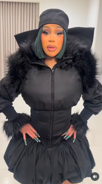 Cardi B posing with her hands on her hips. | Source: Instagram/iamcardib