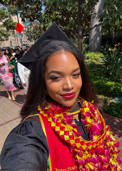 Ashley Jackson posing for a photo on her graduation day, posted on May 16, 2025. | Source: Instagram/ashleylavernejackson