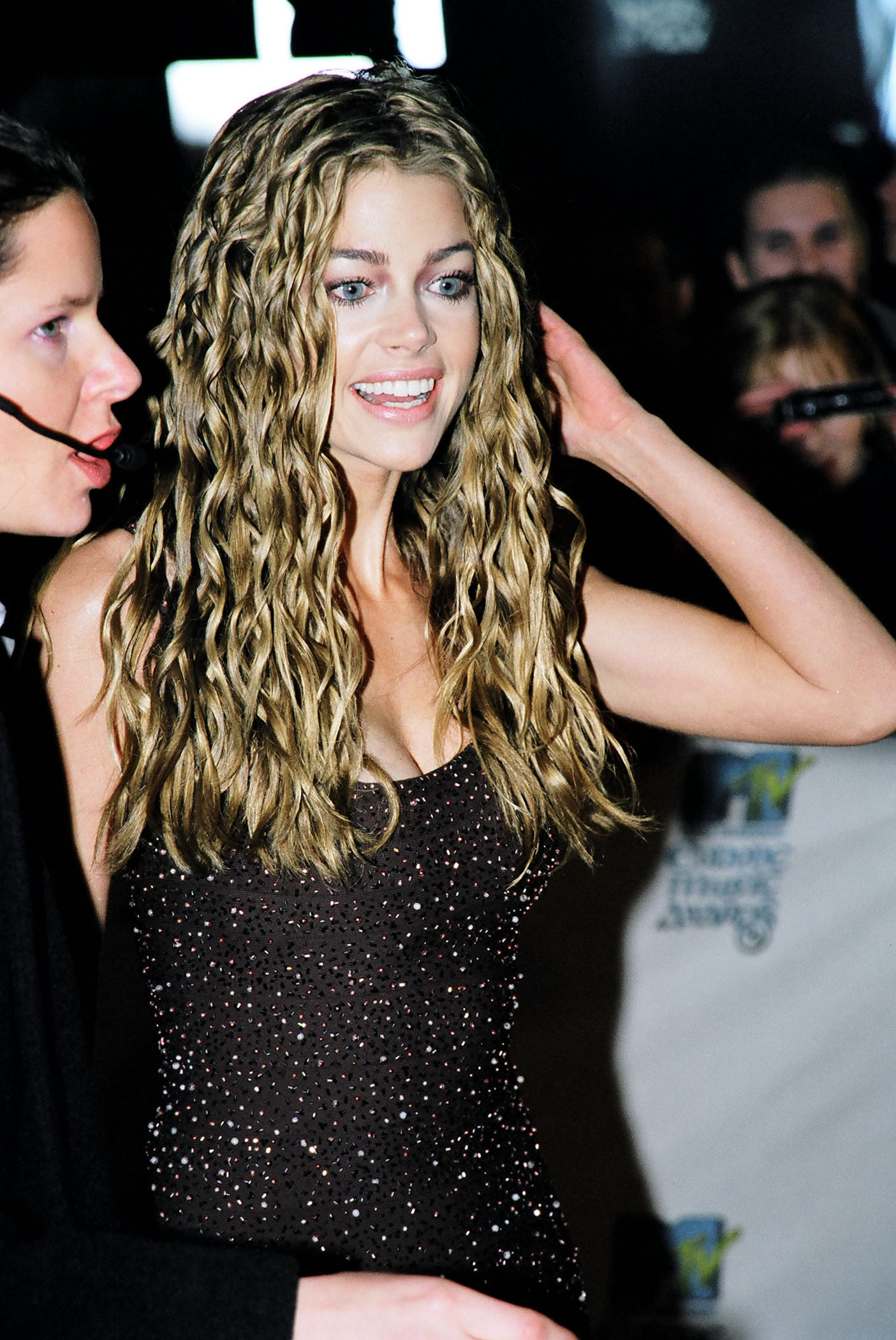 Richards embraced one of the decade's boldest hair trends during her ascent. Years later, images from her early career would help frame the goal of making her look refreshed rather than unfamiliar. | Source: Getty Images