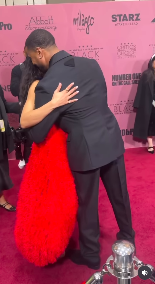 Tessa Thompson and Michael B. Jordan sharing a hug at the event, posted on December 10, 2025. | Source: Instagram/people