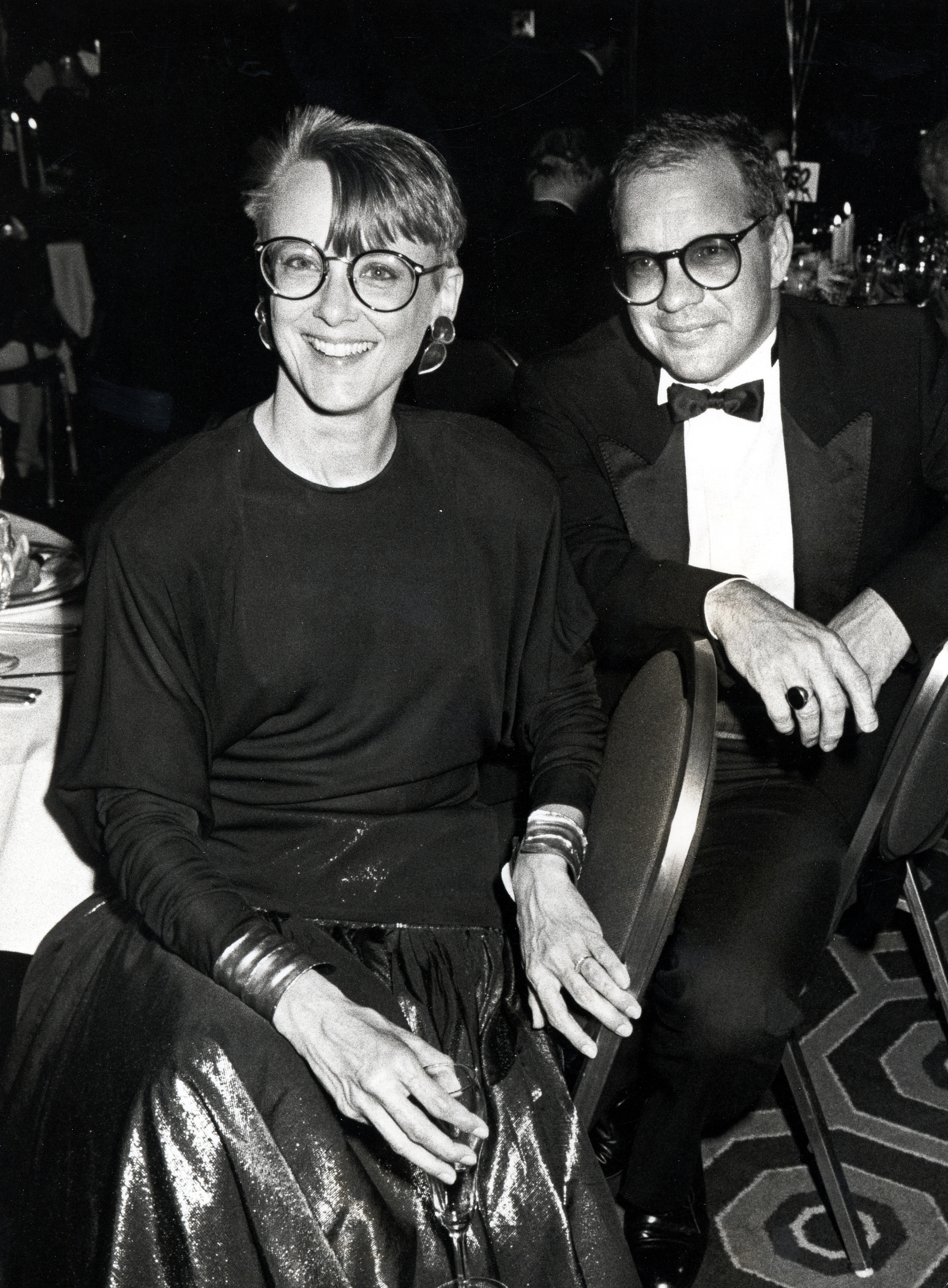 Mary Beth Hurt and Paul Schrader attend the Tony Awards after-party in New York City, with Hurt in glasses and an elegant dark outfit. Their poised appearance captured the couple at a high-profile Broadway celebration.