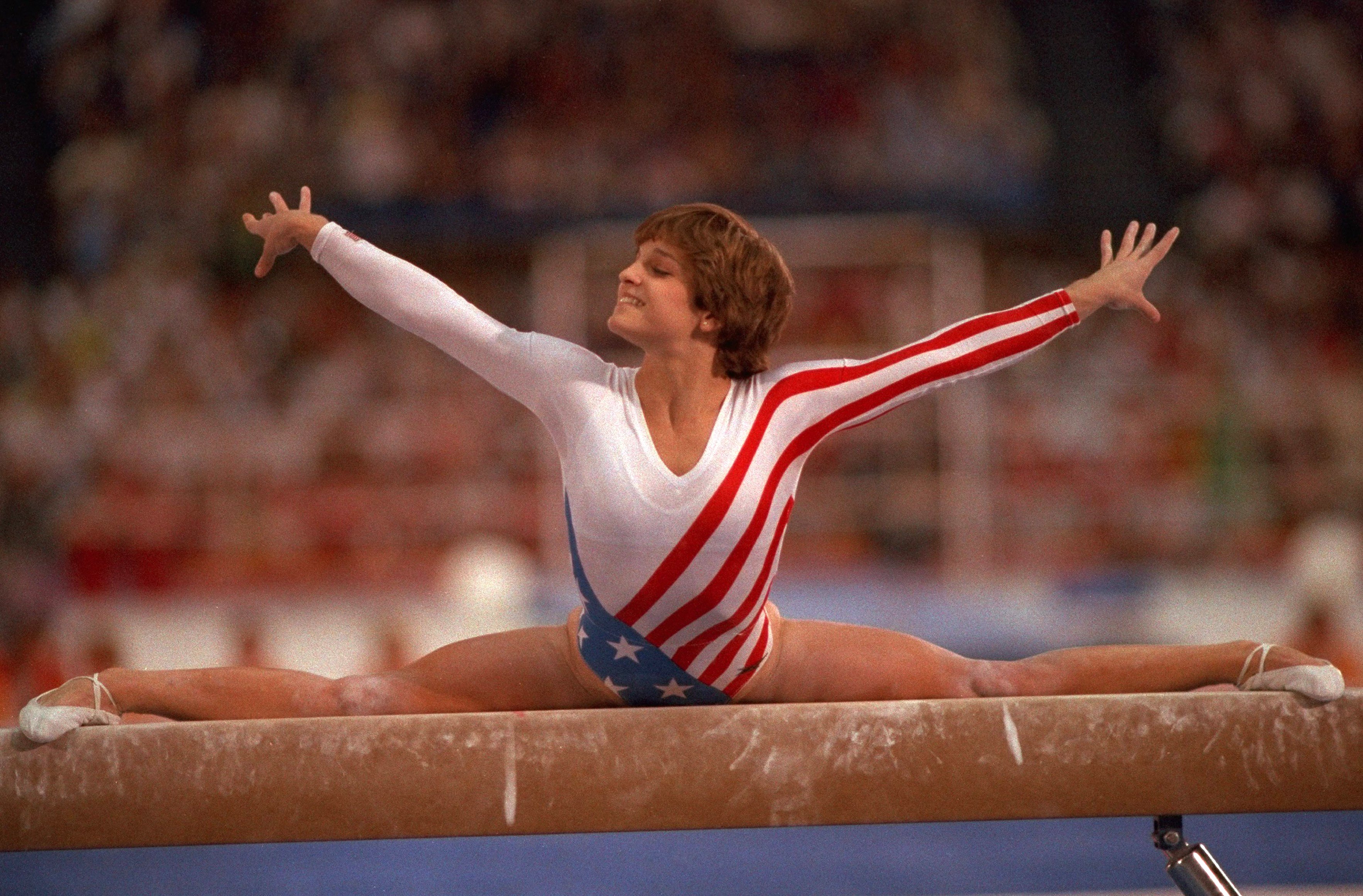 Mary Lou Retton in action, split on balance beam during the Women's All-Around competition at Pauley Pavilion on July 28, 1984, in Los Angeles, California | Source: Getty Images