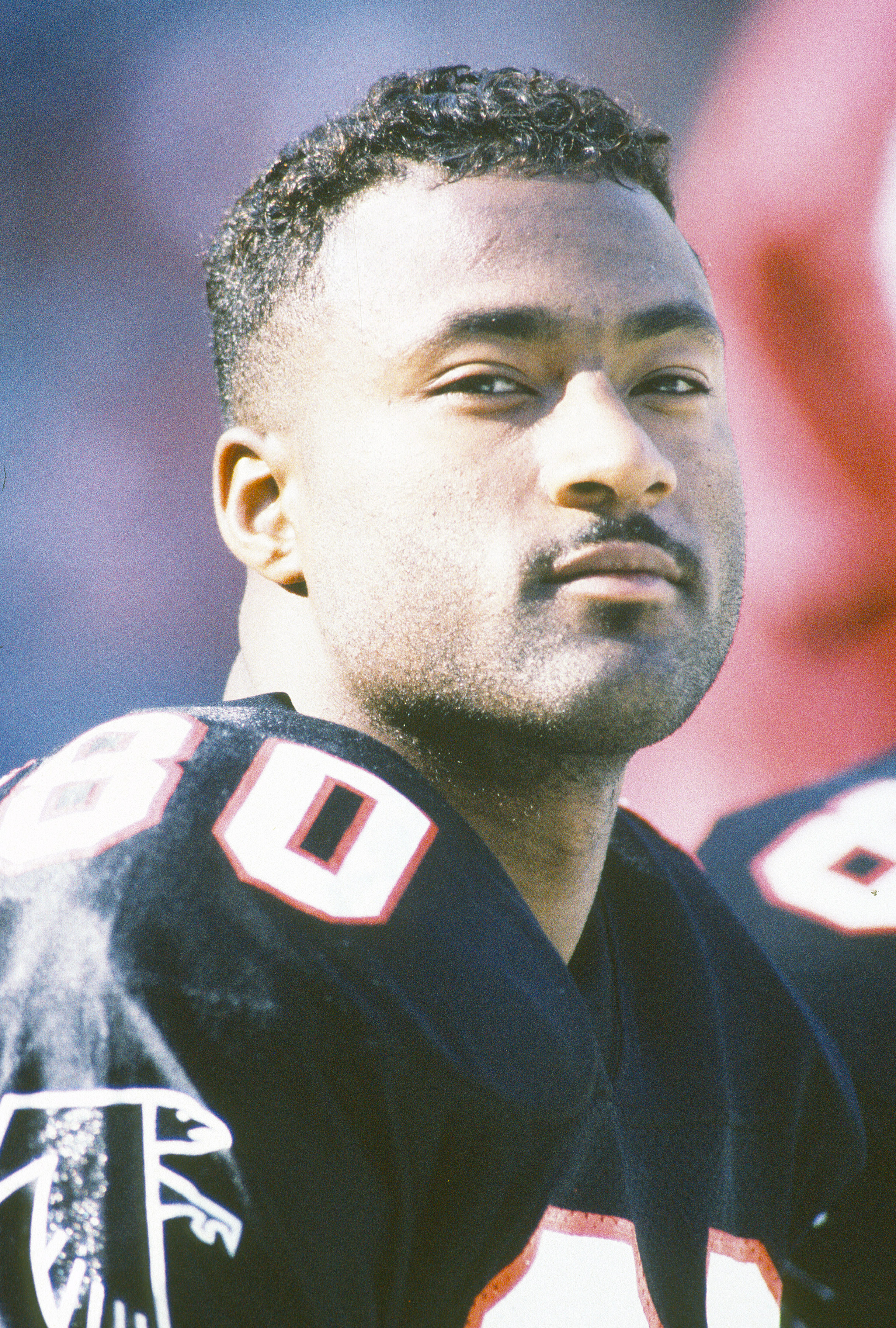 Andre Rison looks on from the bench against the Minnesota Vikings during an NFL Football game on September 8, 1991 | Source: Getty Images