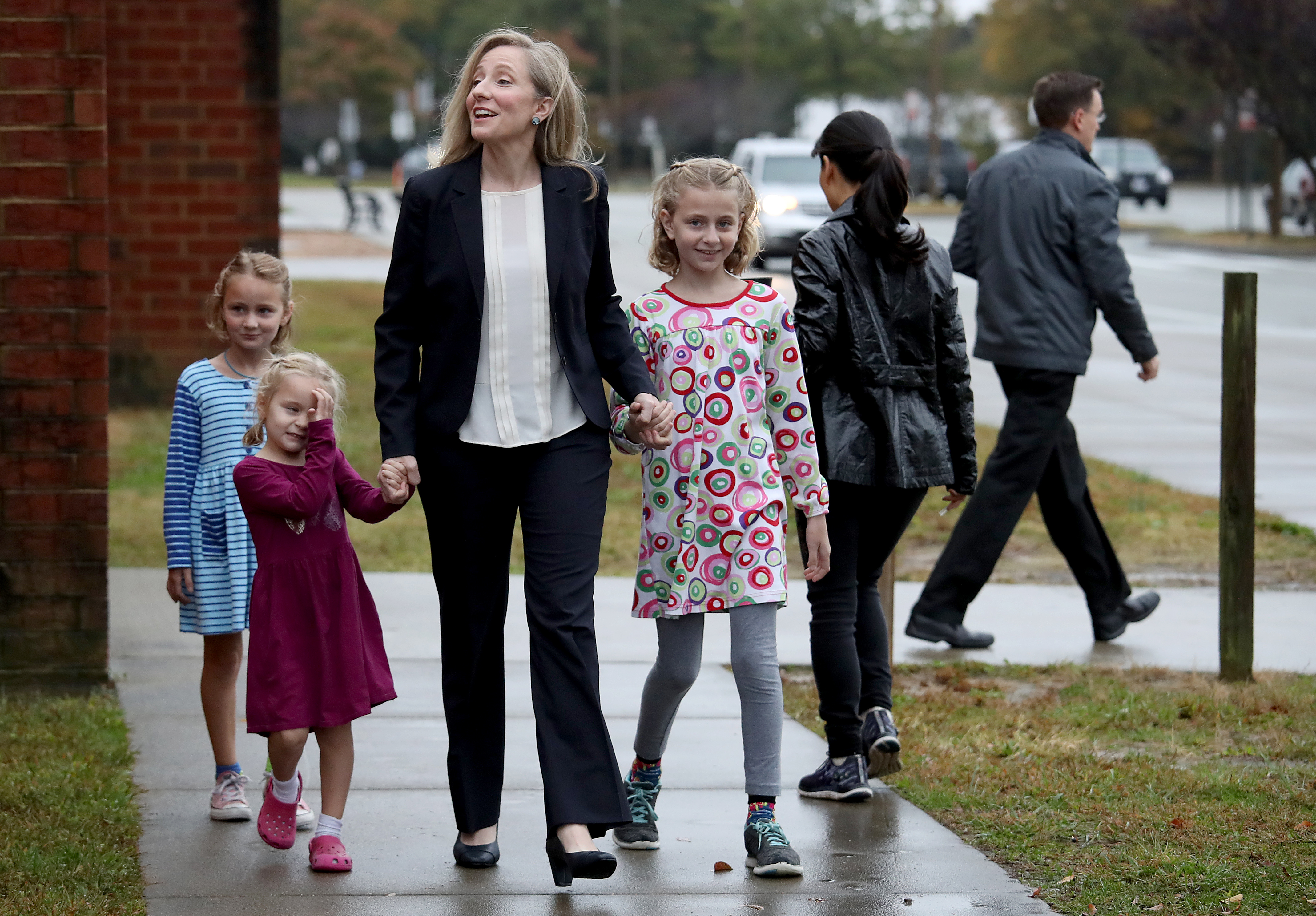 Abigail Spanberger arrives to vote with her daughters at Deep Run High School on November 6, 2018, in Glen Allen, Virginia | Source: Getty Images