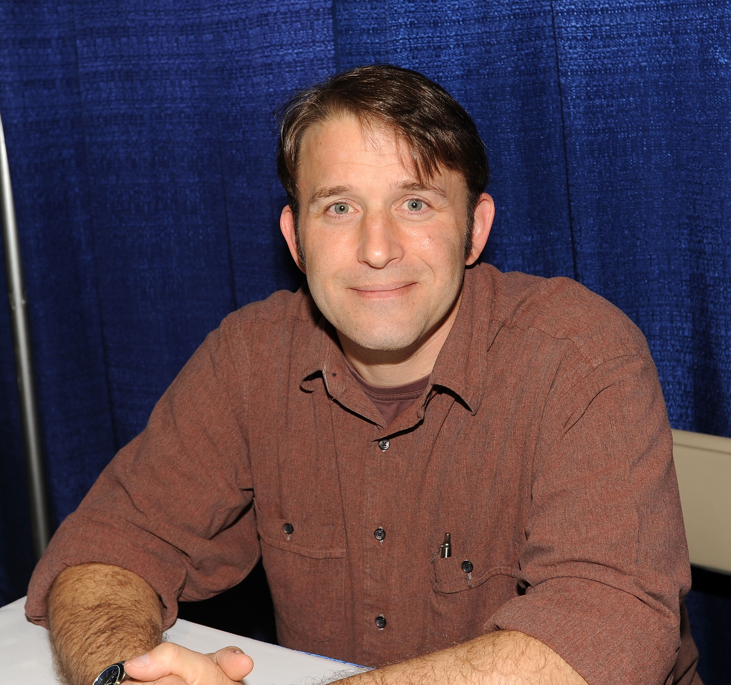 Ilan Mitchell-Smith embraced his legacy as an '80s teen icon while connecting with fans. In this photo, he attended Rhode Island Comic Con at the Rhode Island Convention Center on November 2, 2013, in Providence, Rhode Island. | Source: Getty Images