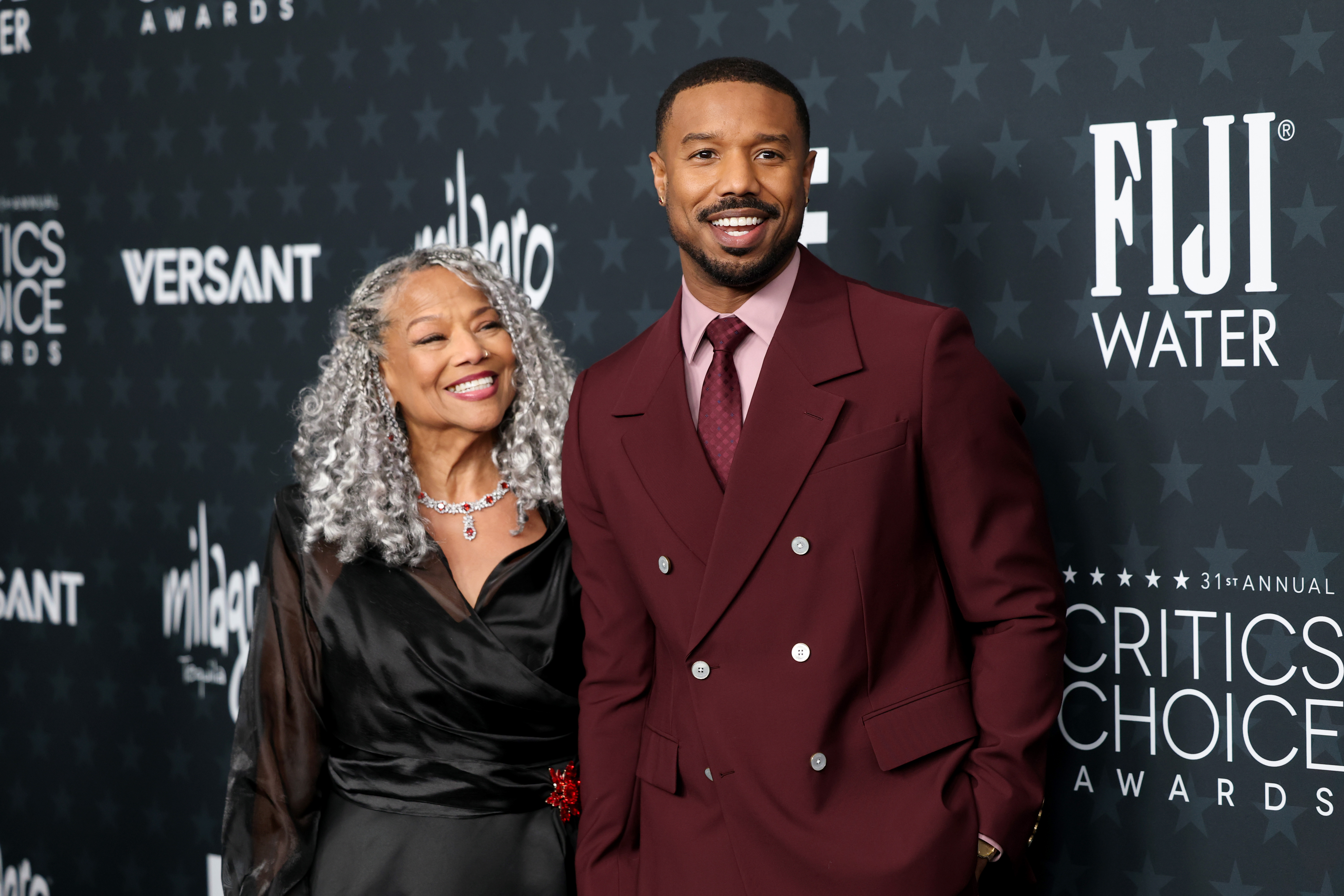 Michael B. Jordan with his mother, Donna Jordan, on the red carpet at the 2026 Critics Choice Awards | Source: Getty Images