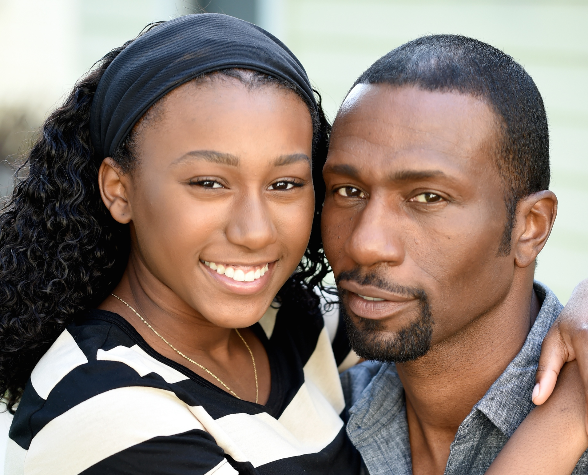 Noelle and Leon Robinson posing during a portrait session in Santa Monica, California on April 14, 2014. | Source: Getty Images