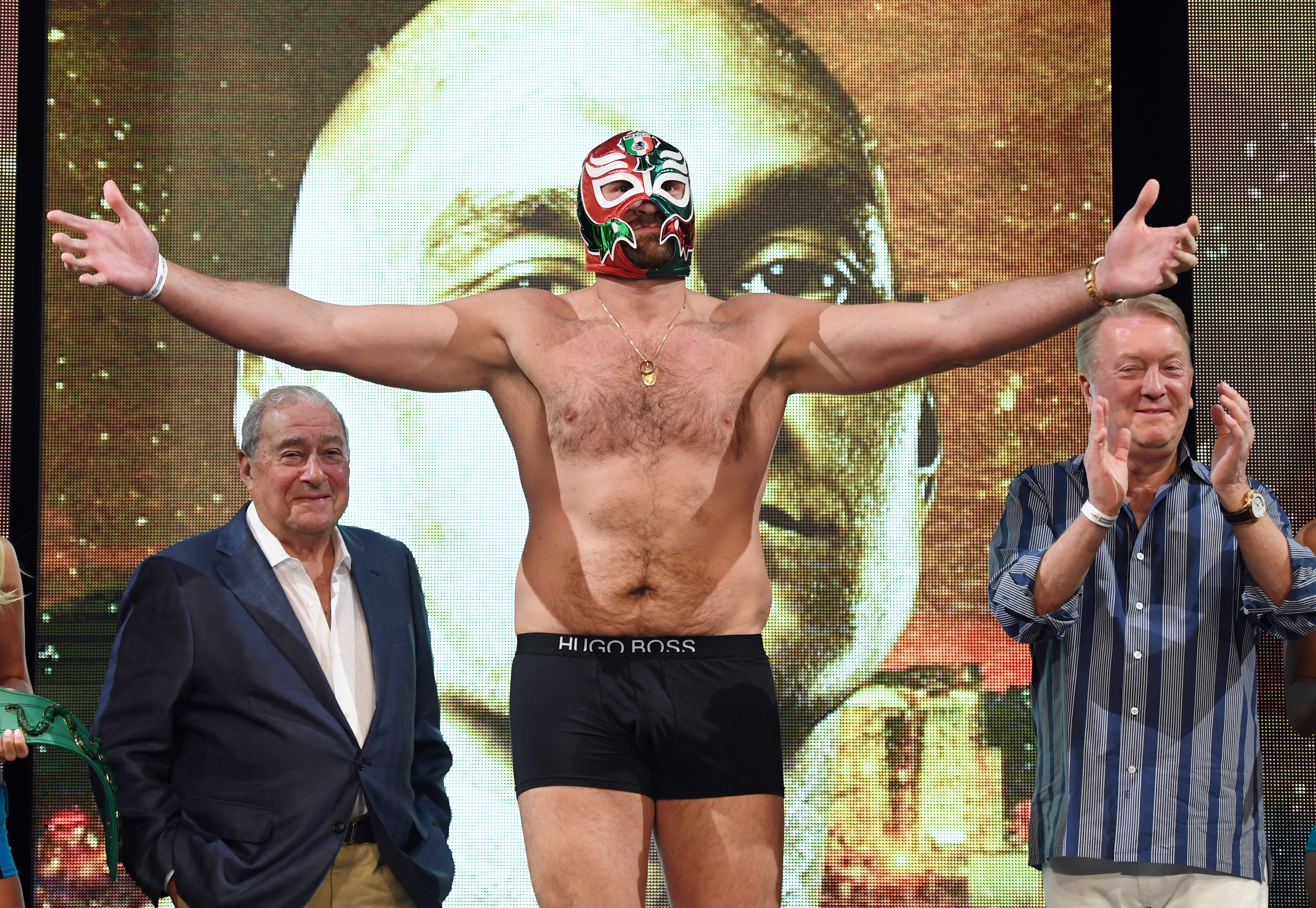 Tyson Fury spread his arms during a ceremonial weigh-in at the MGM Grand Hotel & Casino in Las Vegas, Nevada, on September 13, 2019. By this stage, the heavyweight's comeback was well underway after he had shed about ten stone before facing Deontay Wilder in 2018. Fury had since continued rebuilding his career, with his dramatic physical transformation accompanying his return to boxing's biggest stages.