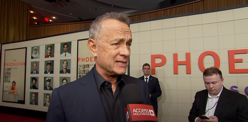 Tom Hanks at the premiere of "The Phoenician Scheme" while being interviewed about E.A. Hanks' book, dated May 29, 2025 | Source: Youtube/Access Hollywood