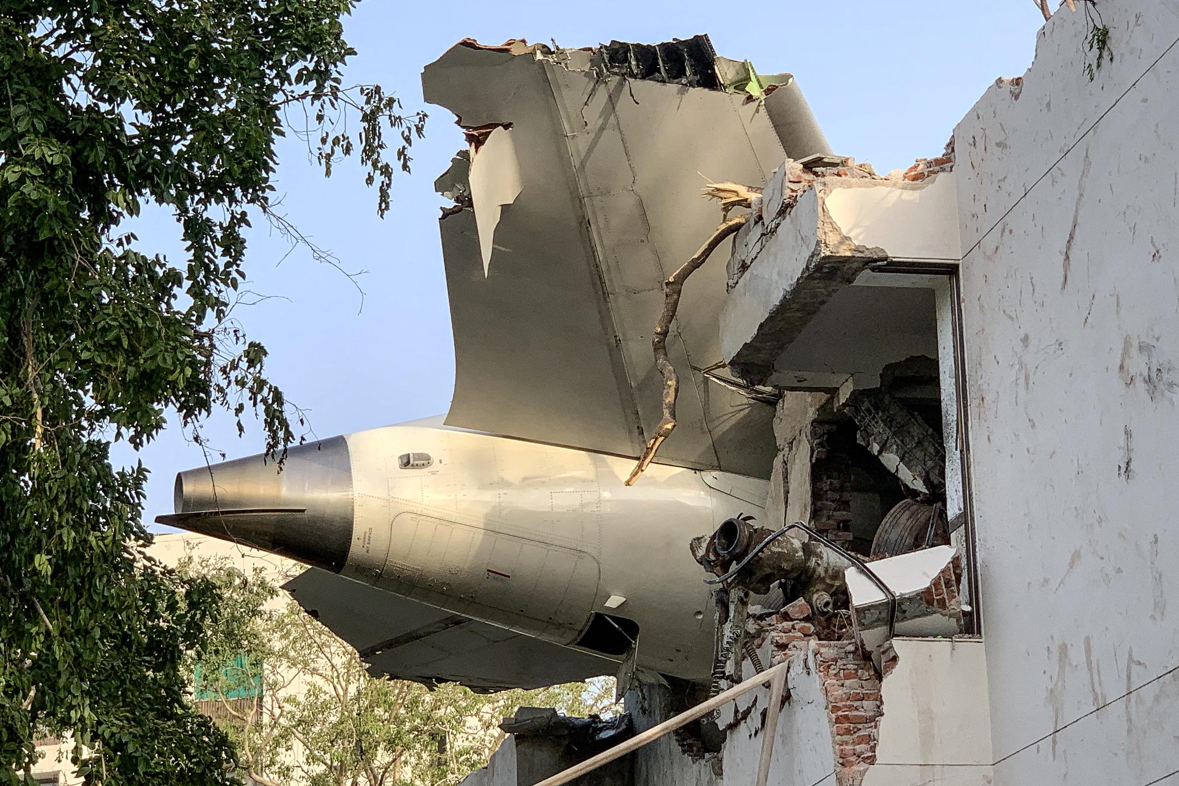 The back of Air India flight 171 is pictured at the site after it crashed in a residential area near the airport in Ahmedabad on June 12, 2025 | Source: Getty Images