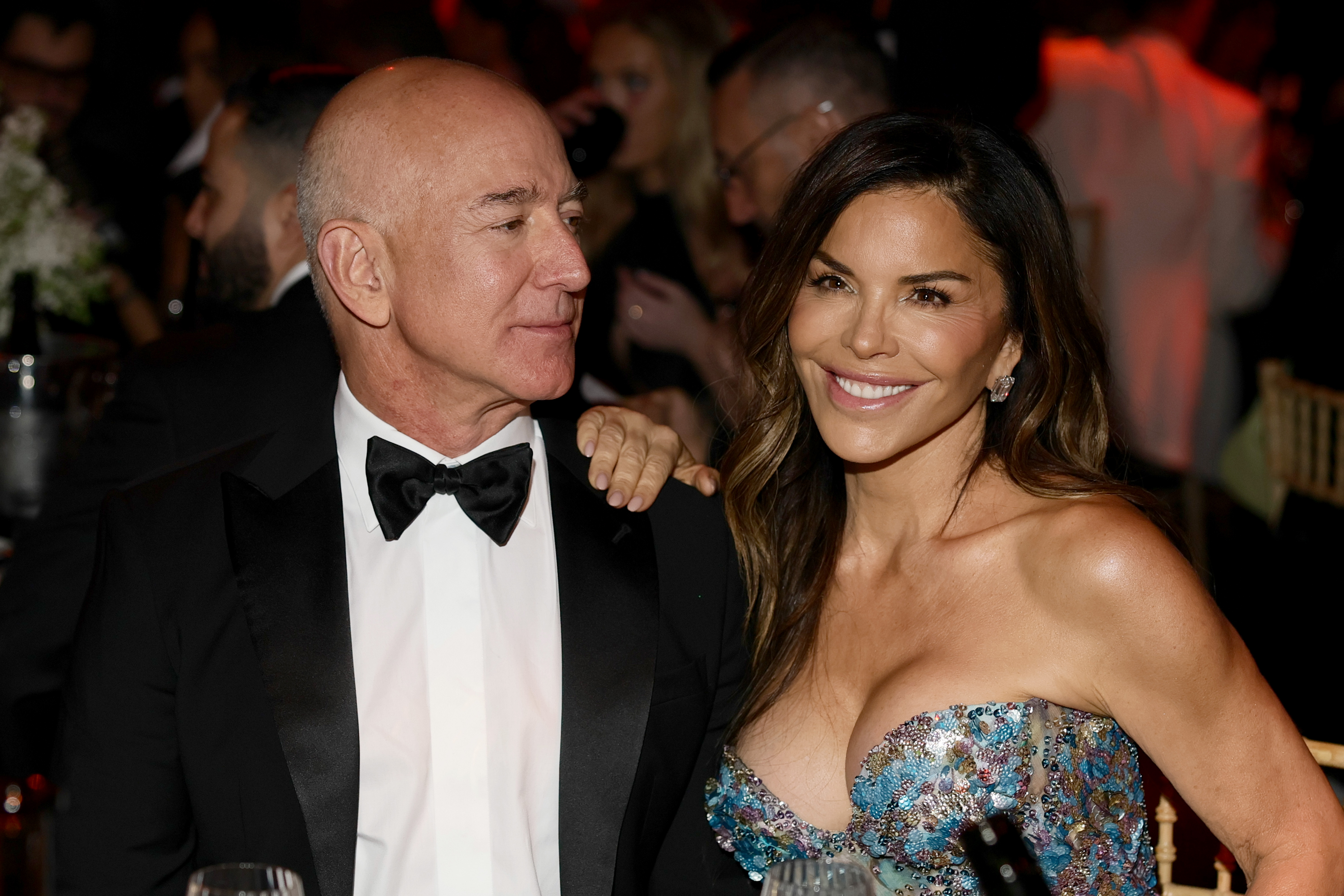 Jeff Bezos and Lauren Sanchez seated together at the amfAR Gala Cannes 2025, held at Hotel du Cap-Eden-Roc and presented by Chopard, May 22, 2025, in Cap d’Antibes, France | Source: Getty Images