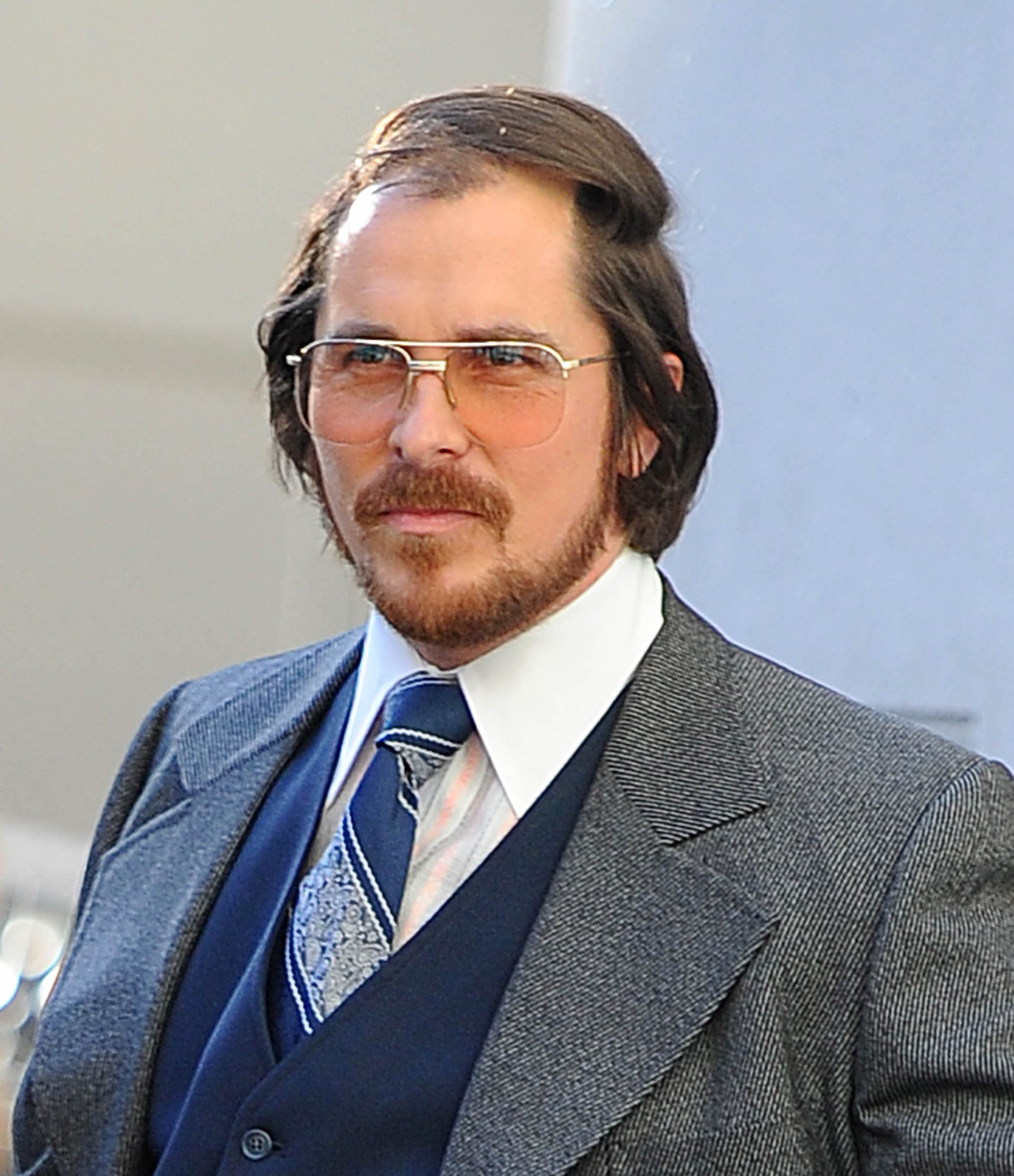 Christian Bale is seen on the set of "American Hustle" in New York on May 17, 2013. | Source: Getty Images