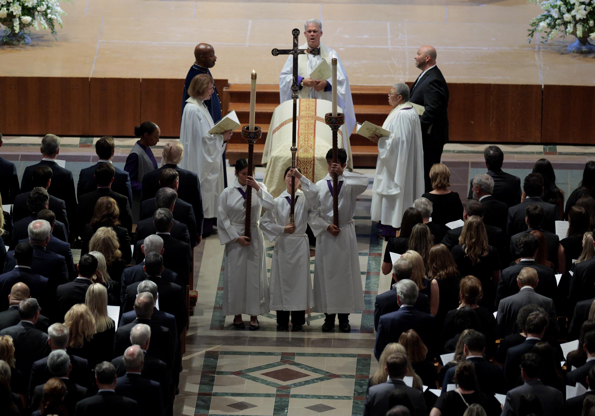 A military body bearer team carries the casket of late Senator Lindsey Graham from Washington National Cathedral following the funeral service attended by U.S. President Donald Trump, family members, and other mourners. | Source: Getty Images