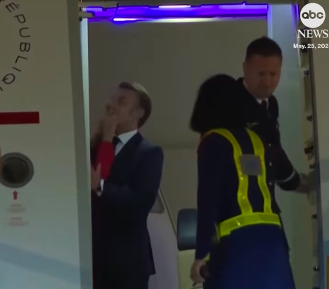Brigitte Macron pushing French President Emmanuel Macron's face as air crew prepare for the couple to disembark, posted on May 26, 2025. | Source: Instagram/abcnews