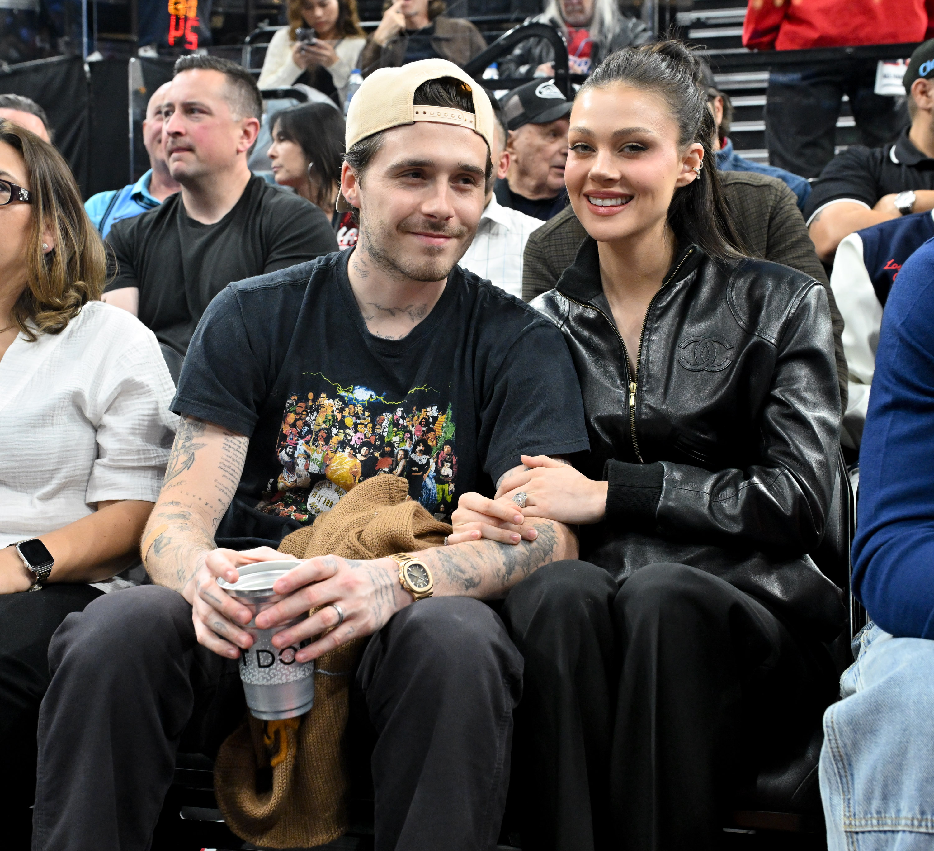 Brooklyn Beckham and Nicola Peltz are at a basketball game between the Los Angeles Clippers and the Denver Nuggets at Intuit Dome in California on April 24, 2025 | Source: Getty Images