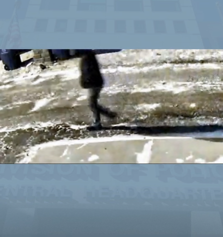 Man with a hoodie walking in an alley near the Tepe's home, from a video dated January 5, 2026 | Source: Facebook/Columbus Division of Police