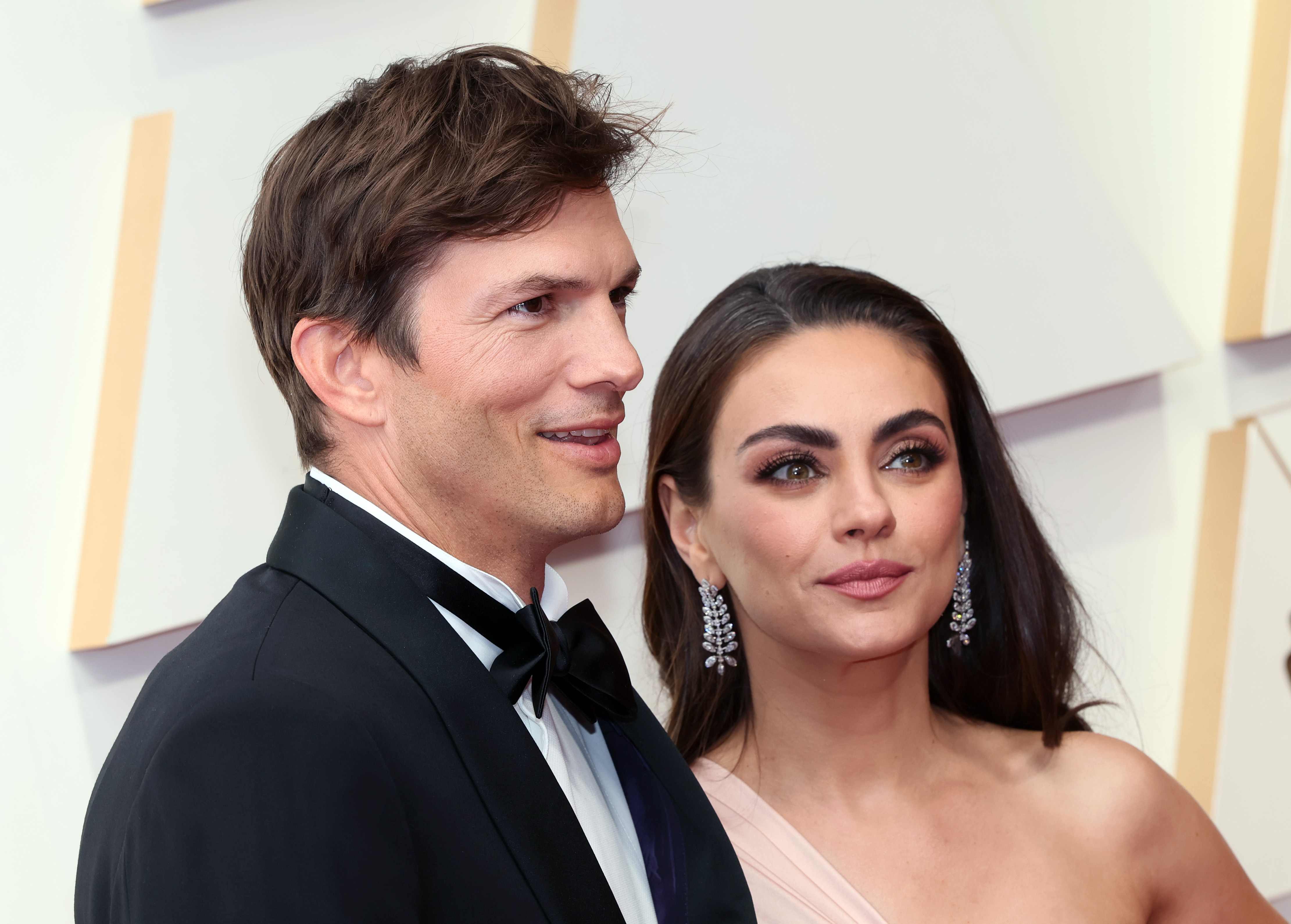 Ashton Kutcher and Mila Kunis at the 94th Annual Academy Awards at Hollywood and Highland on March 27, 2022, in Hollywood, California. | Source: Getty Images